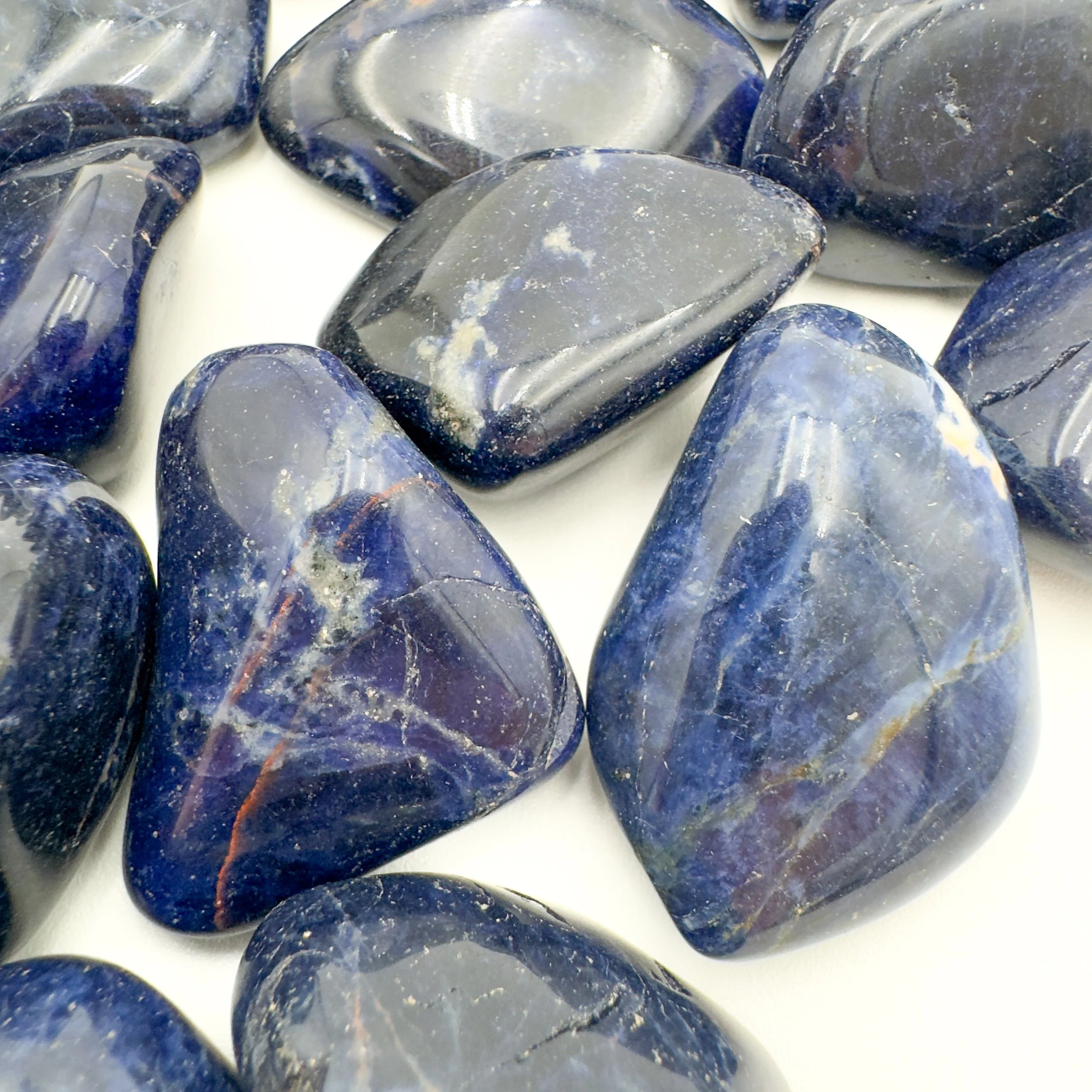 Sodalite Tumbled Stones (1.25-2 Inch - AA Grade - 16-24 Pieces Per Pound) Ethically Sourced from Namibia - Beyond Bohemian