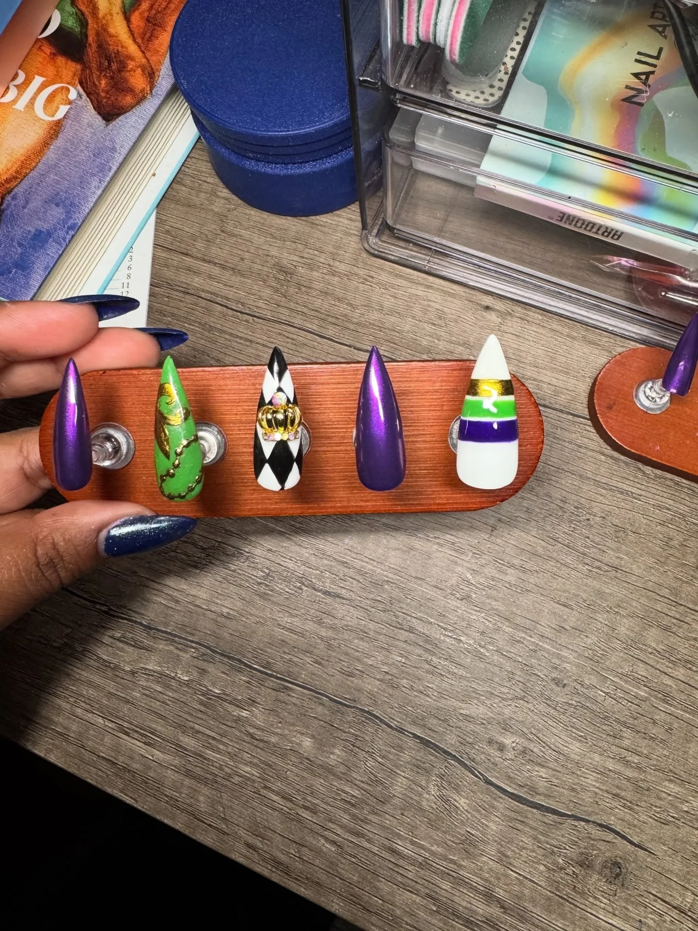 I asked Ella to make me a set of apres Mardi Gras press on nails. Here&rsquo;s the final product! Ella is truly 1 of 1. 
And before y&rsquo;all ask:
Yes, she takes a few clients when time permits but school is currently in session and we don&rsquo;t 