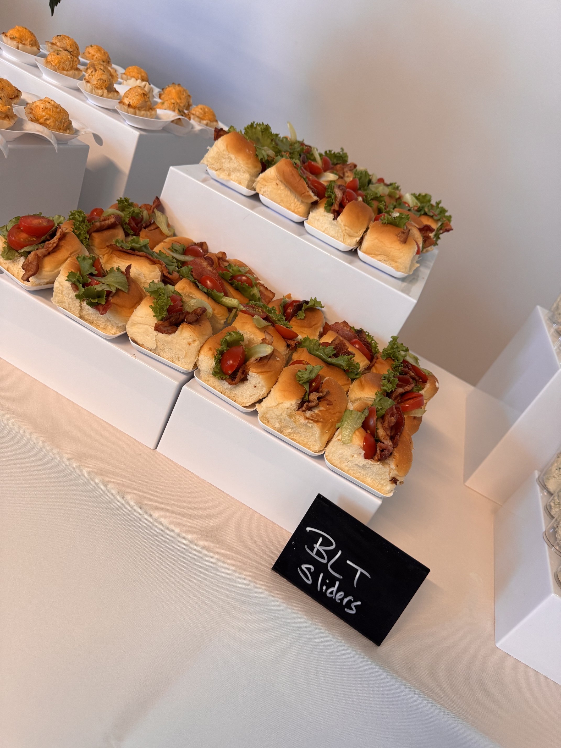 BLT sliders catering in Chicago from Elisa’s Cake by the Pound, featuring mini sandwiches for corporate events, parties, and catered gatherings.