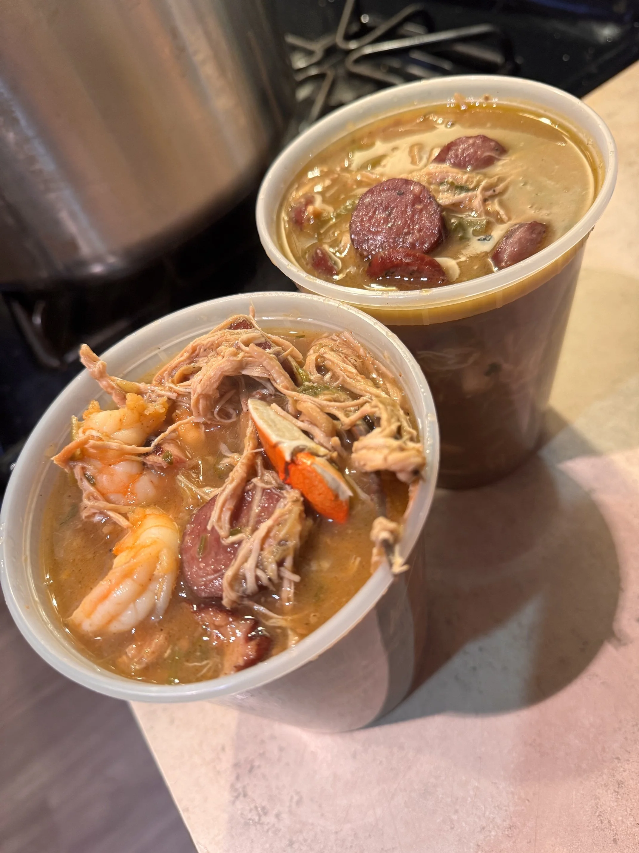 Authentic New Orleans gumbo in Chicago from Elisa’s Cake by the Pound, featuring rich Creole flavor for catering, events, and corporate meals.
