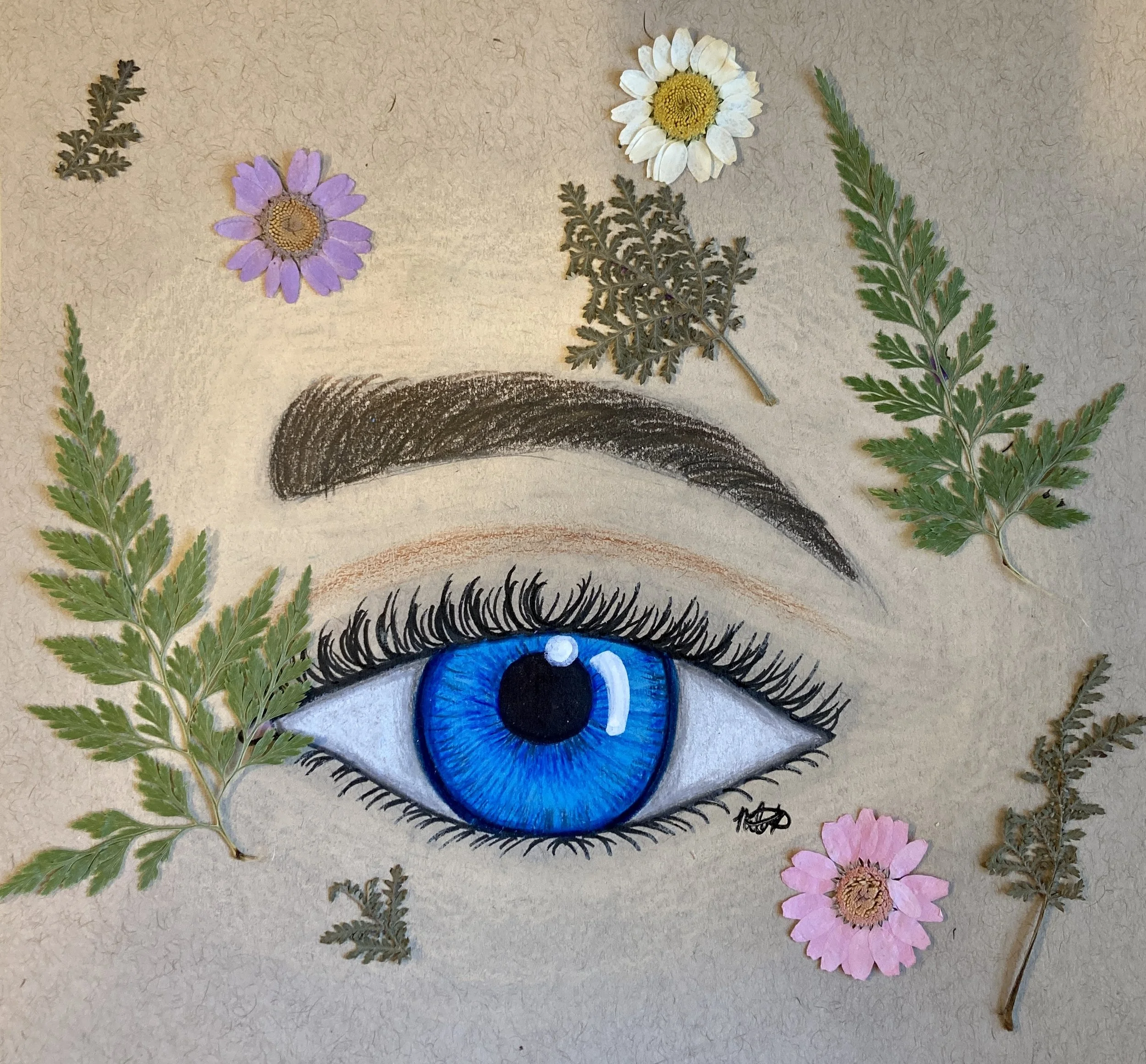 Eye with pressed flowers