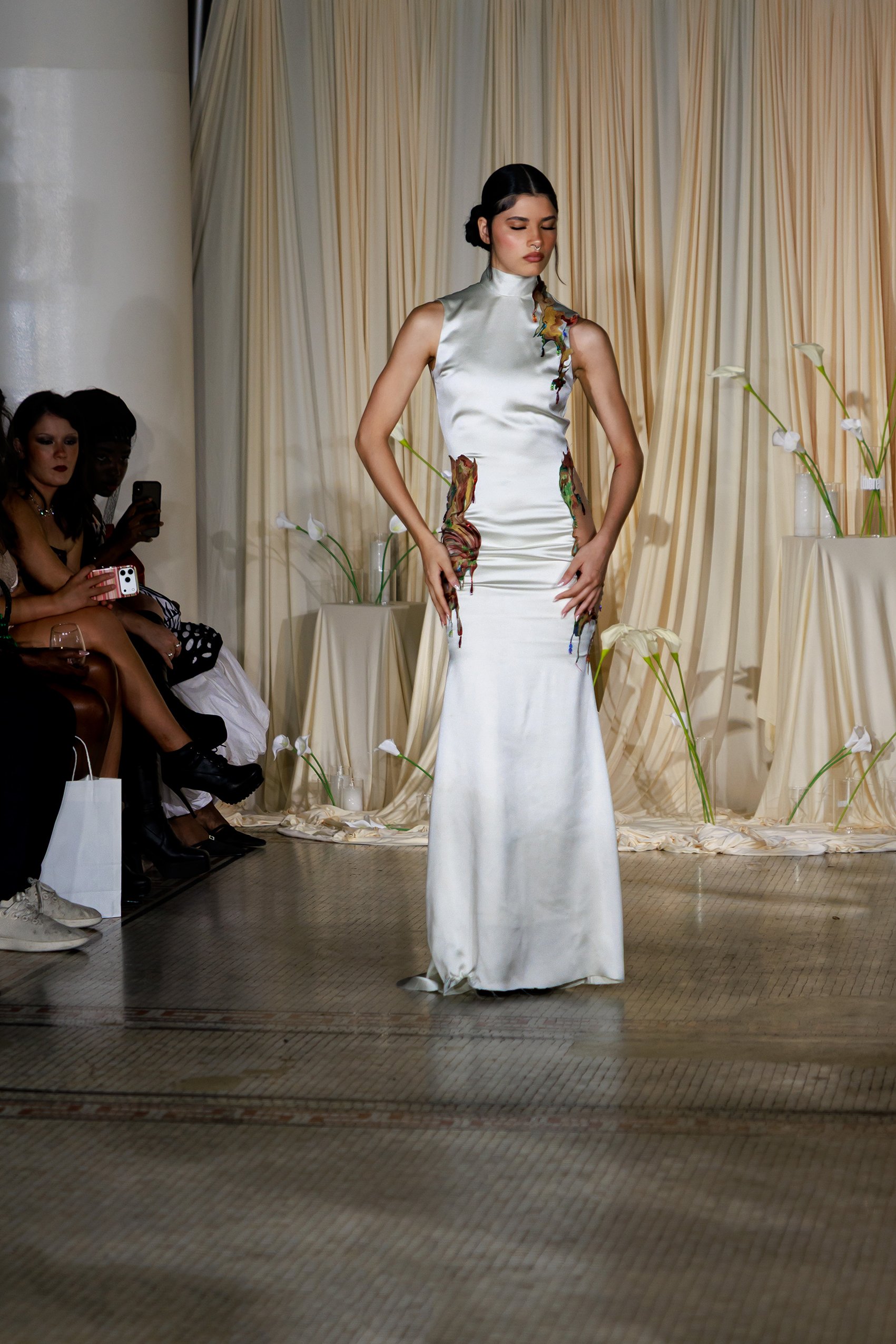 Model posing brand clothing for runway fashion show