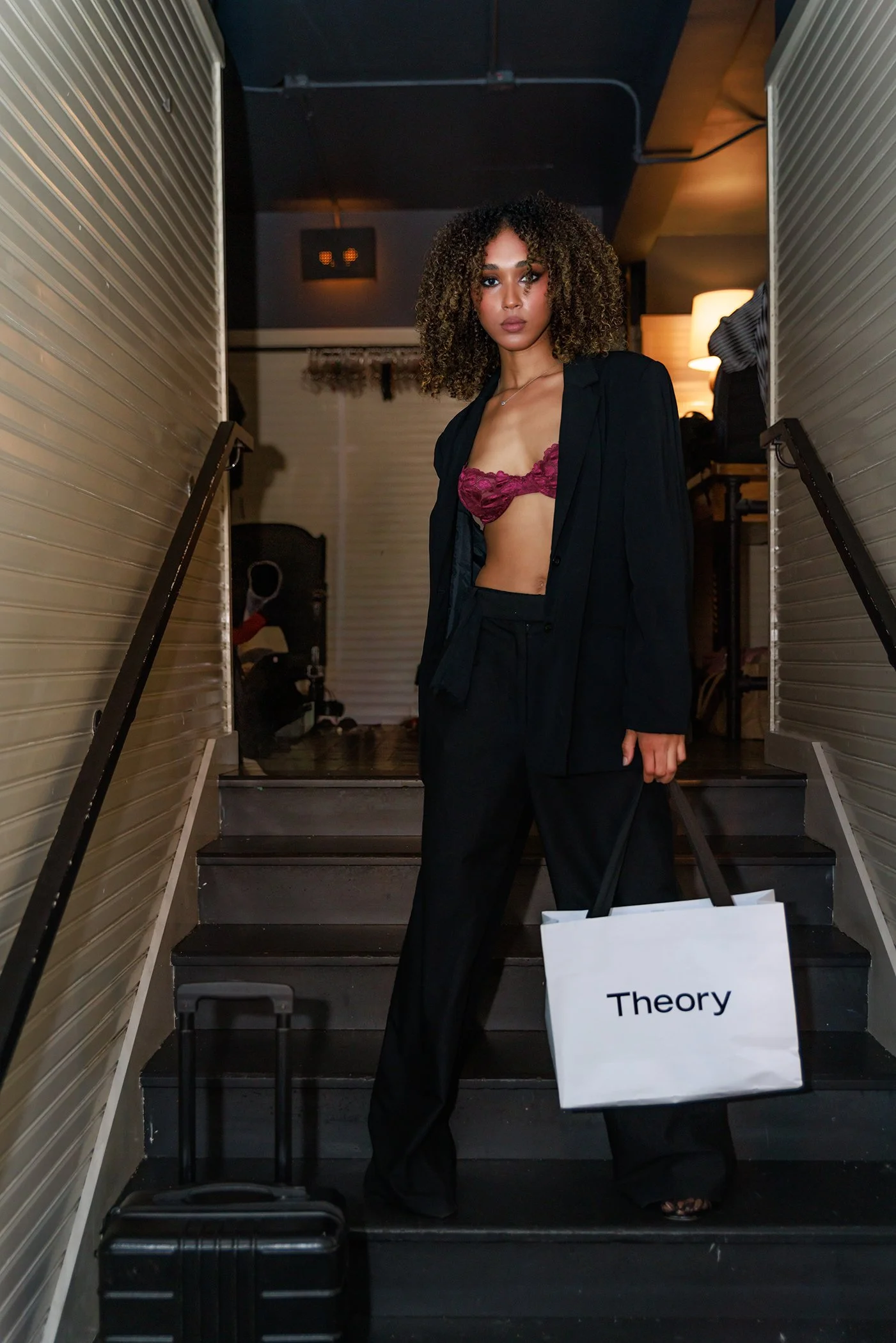 Model posing for sponsors in backstage by Jussara Sandoval Photography