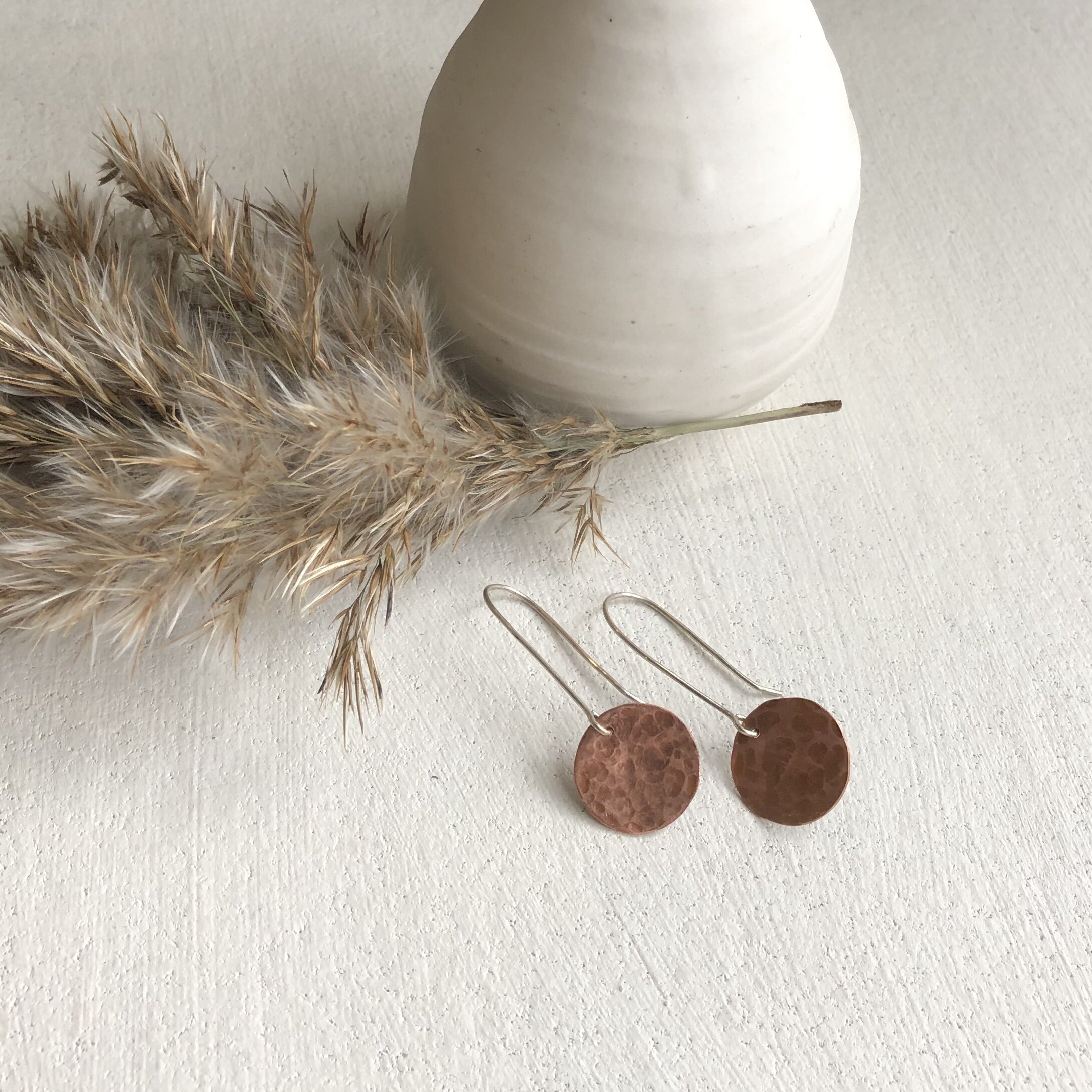 hammered copper earrings.jpg