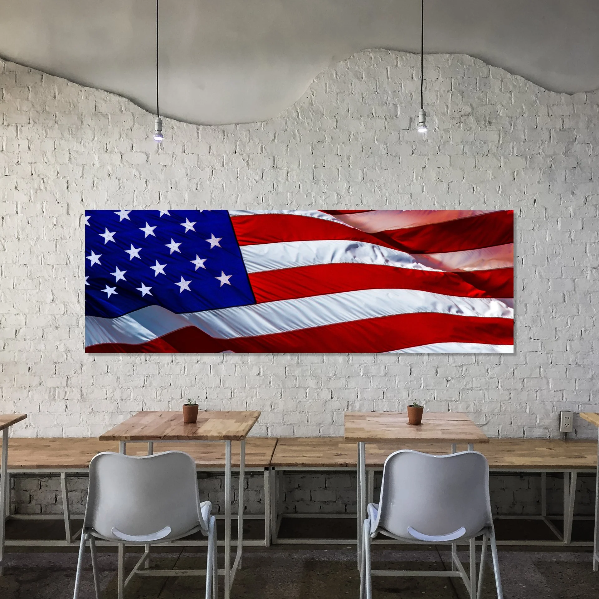 Close-up of American flag waving in the wind with vibrant colors.