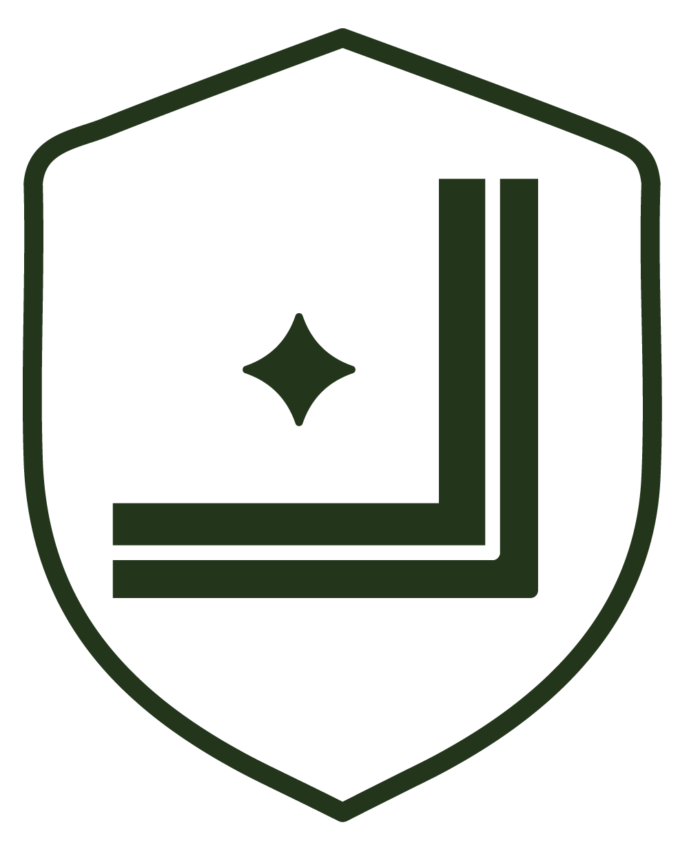 Digital icon of a shield with a picture frame and a star-like sparkle in the center, in dark green outline.