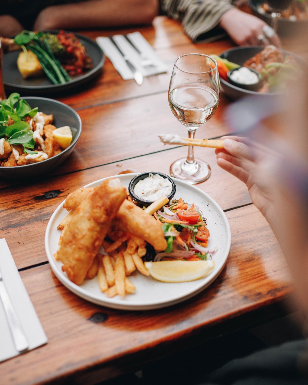 Tap into a proper summer classic. Our fish &rsquo;n&rsquo; chips land crisp, golden and generous - served with chips, a fresh garden salad and herb⁠
tartare sauce. Simple, fresh, and bloody satisfying.