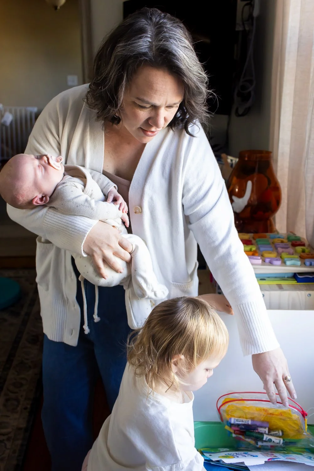 Mom with daughters at home