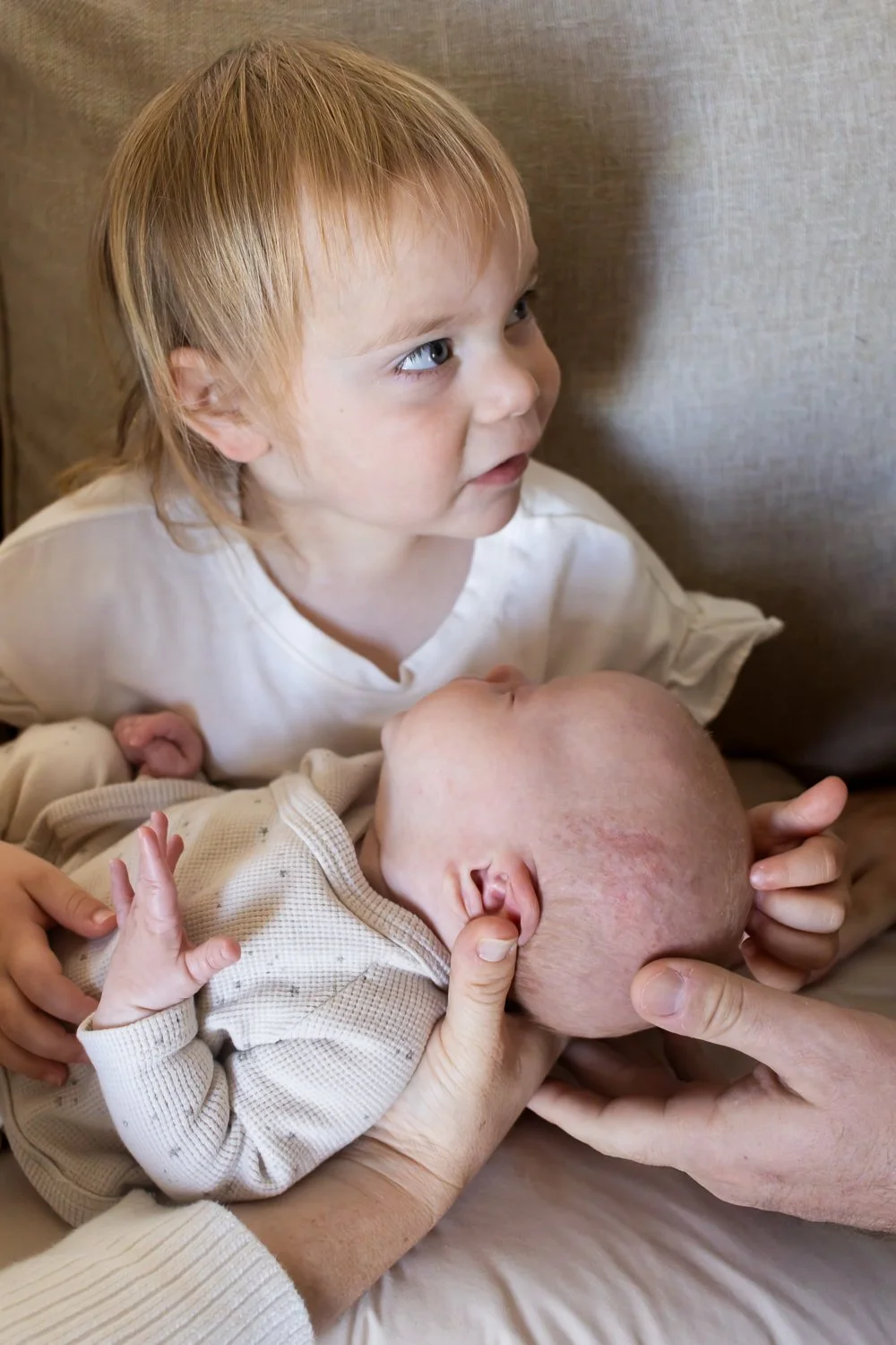 Older sister and baby family photos