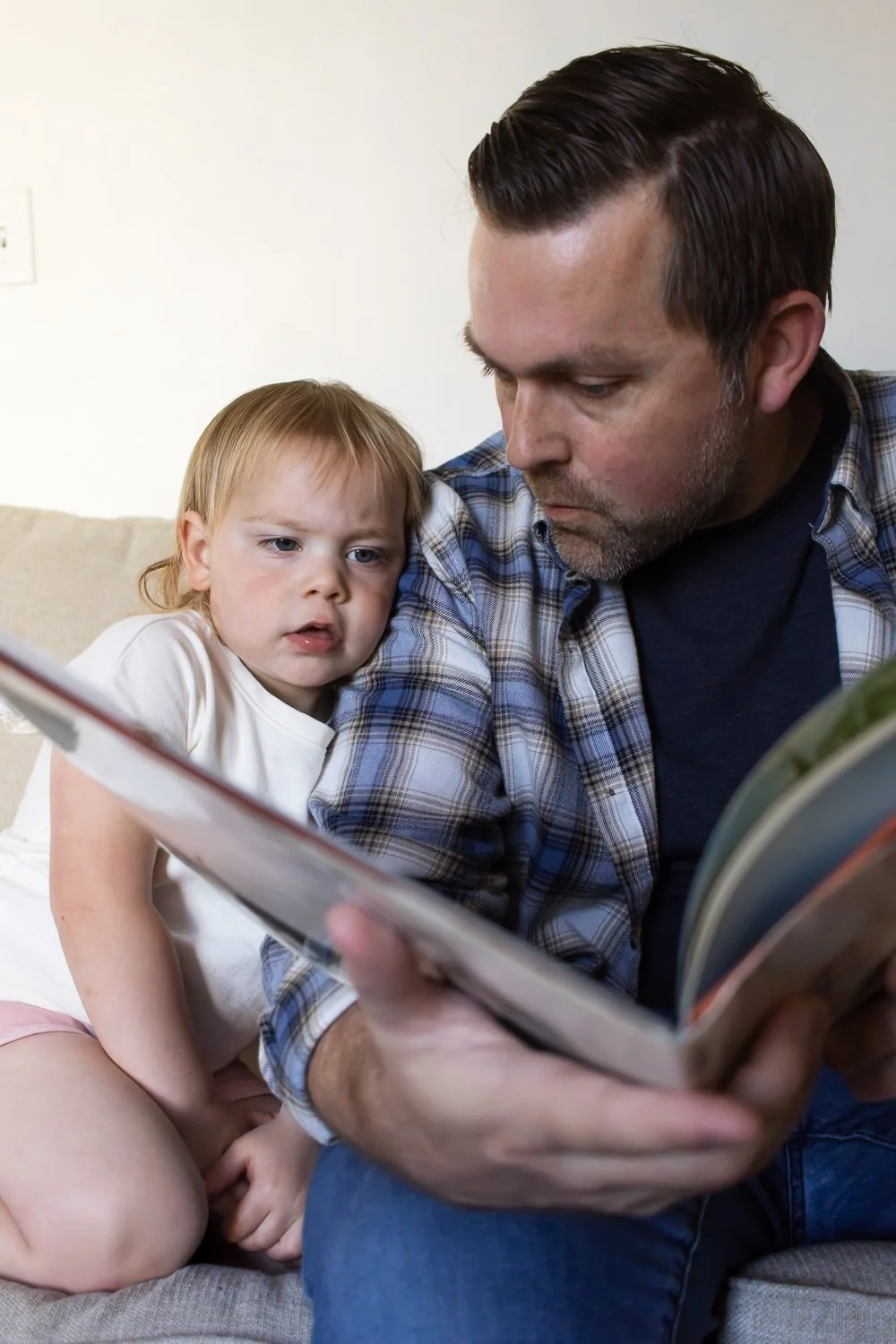 Reading a book together at home