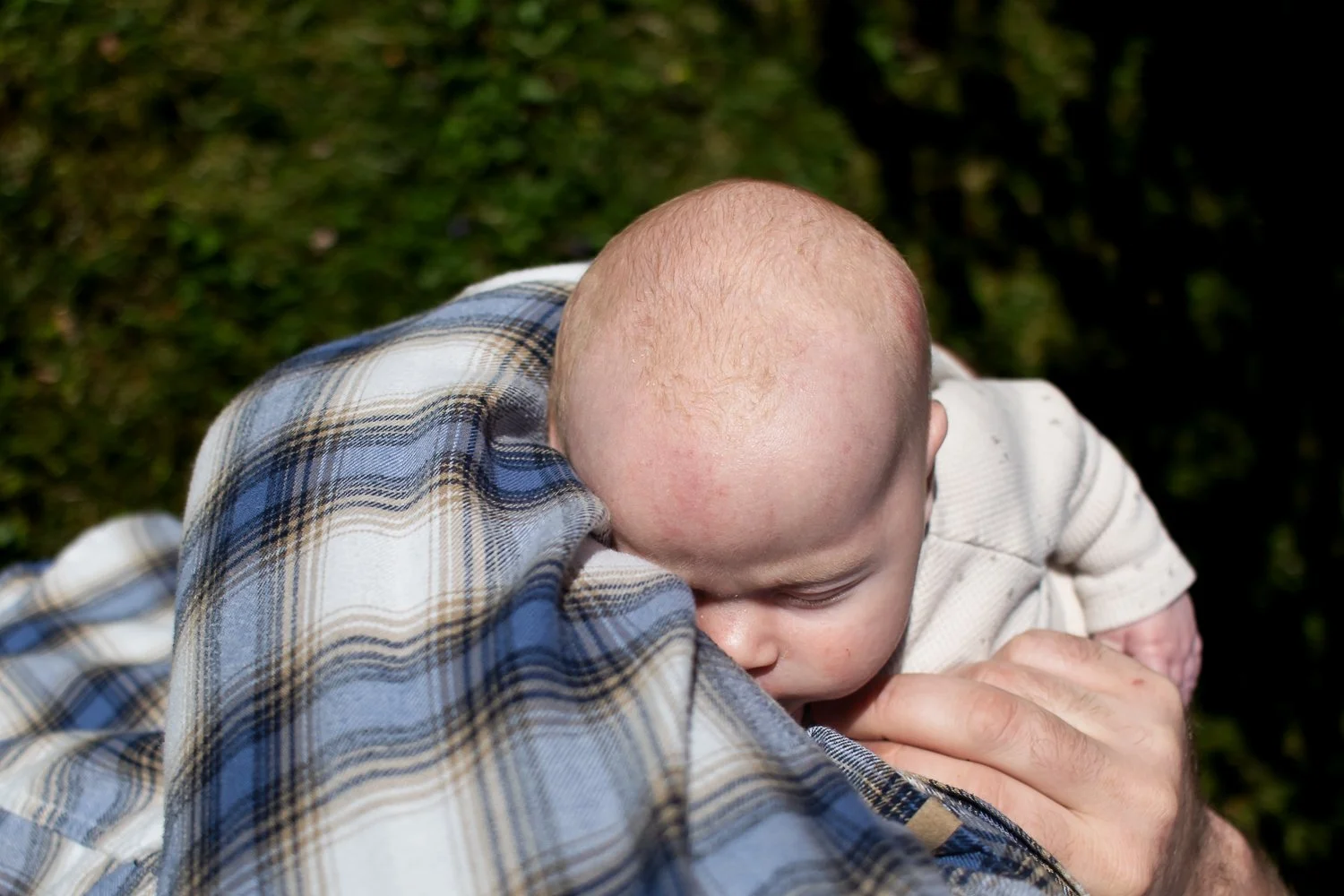 In Dad's arms outside