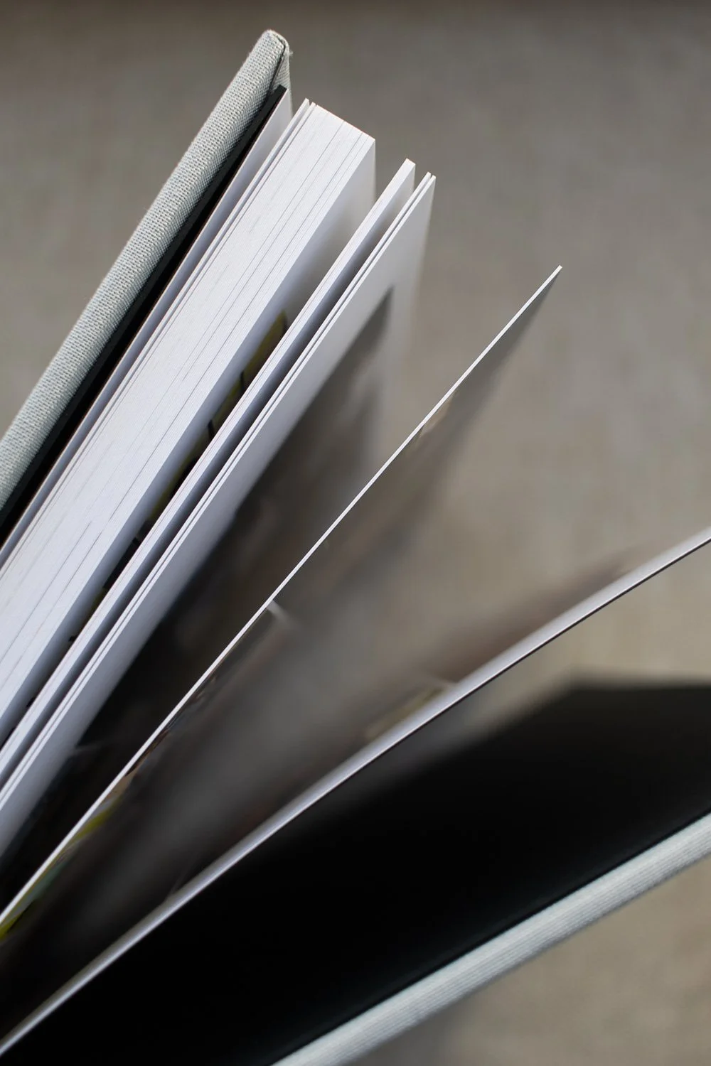 A photo book standing up with stiff pages