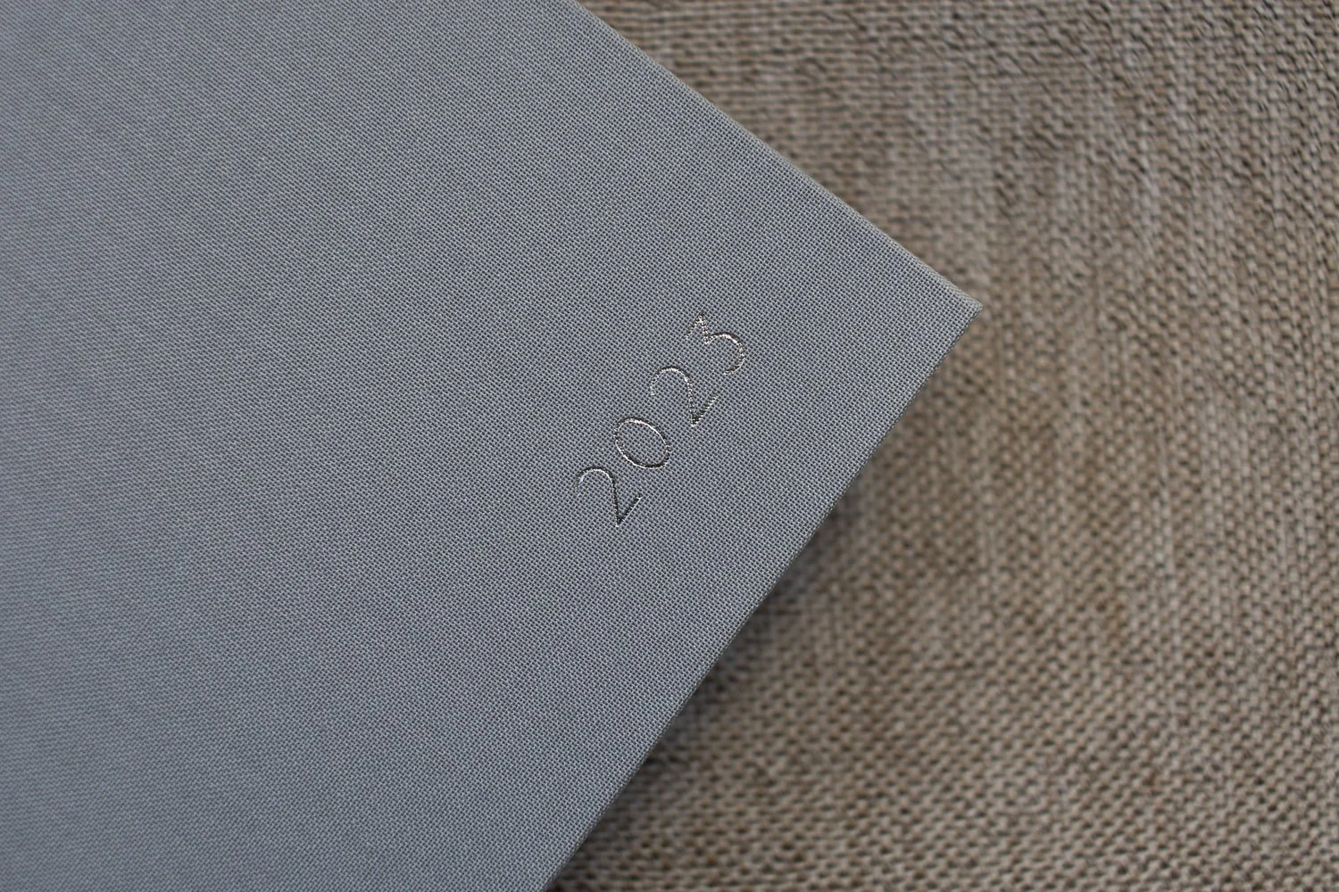 The cover of a yearbook with the year embossed in silver foil.