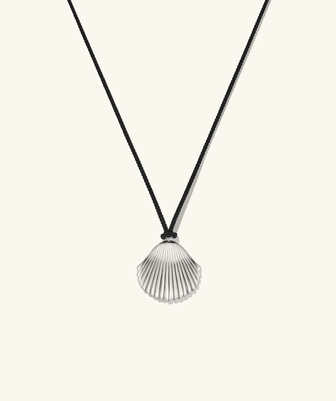 0-ShellCordNecklace_SS_OffFigureFrontView_PDP.webp