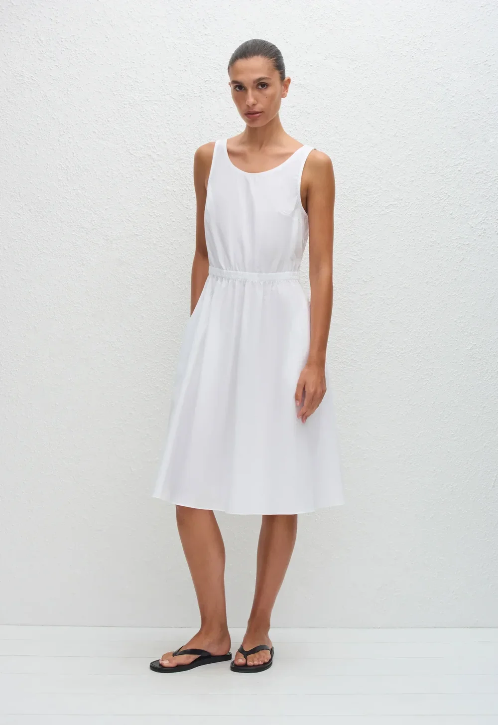 TMIDR_WHITE_TANKMIDIDRESS_MODELDay03_Cristina4139_1440x.webp