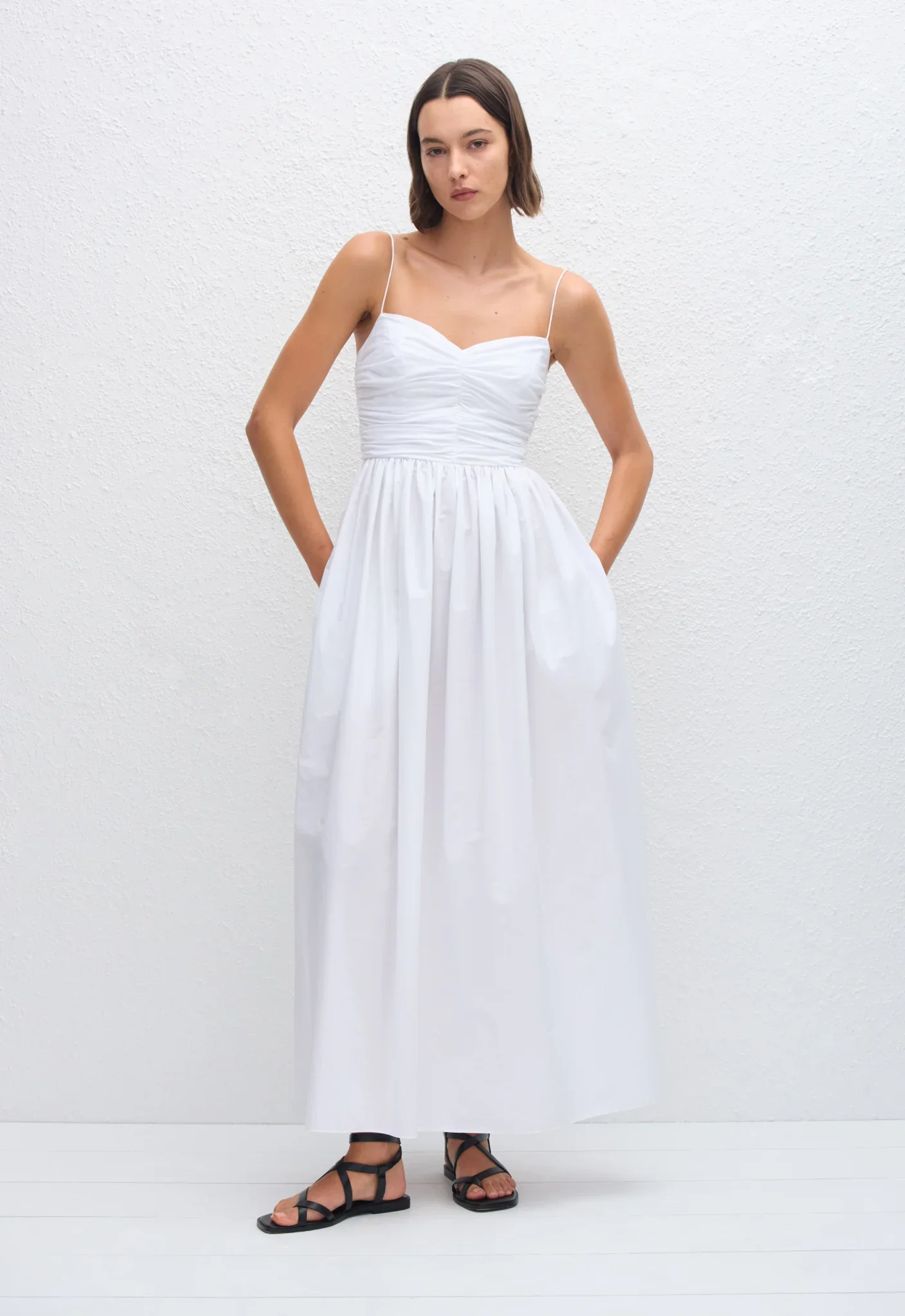 GABDR-W-WHITE_GATHEREDBODICEDRESS_MODELDay01_Alida0942_1440x.webp