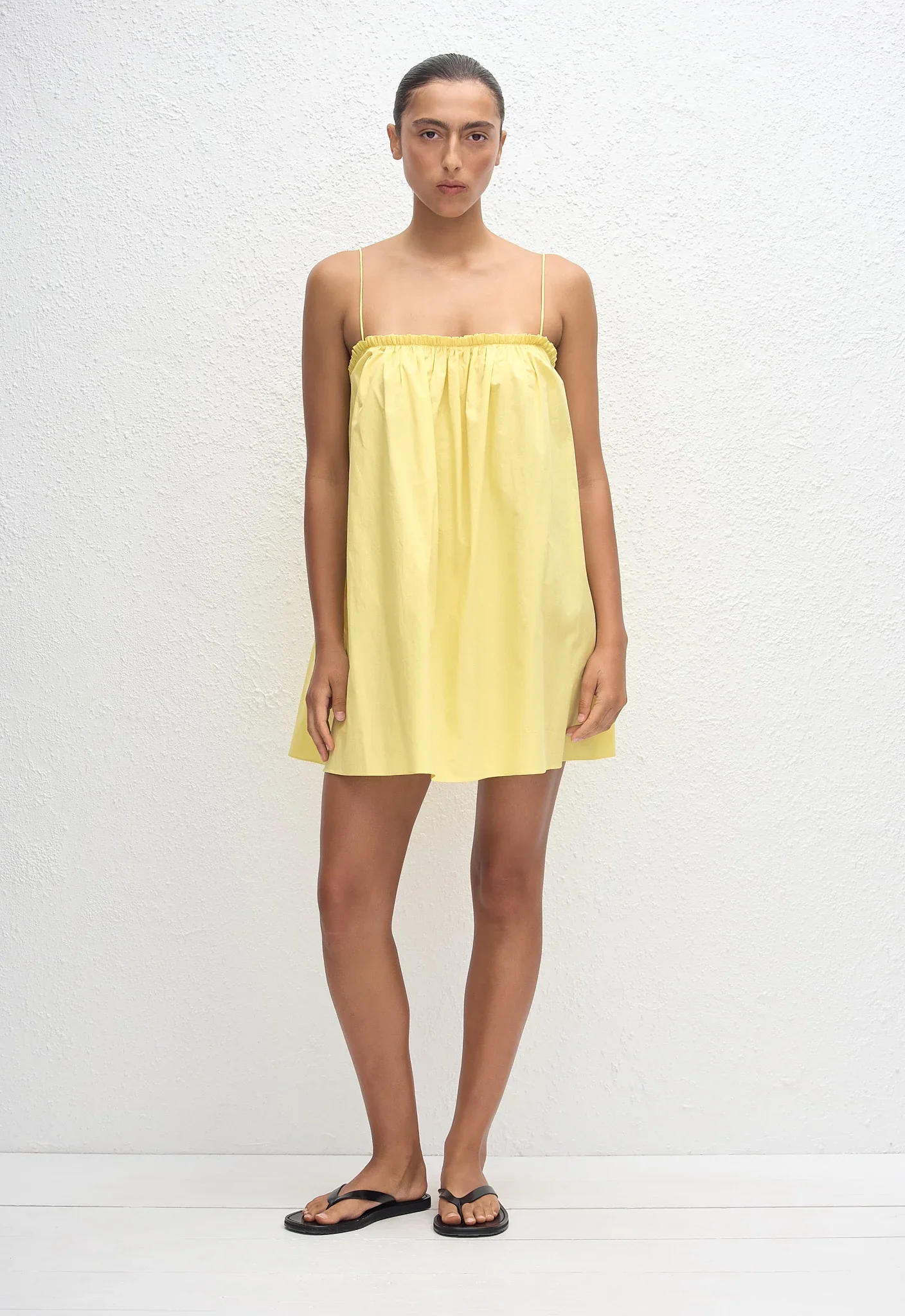 FCMDR_LIMONCELLO_FRILLCAMIMINIDRESS_MODEL_ED1_26_Mia691_1440x.webp
