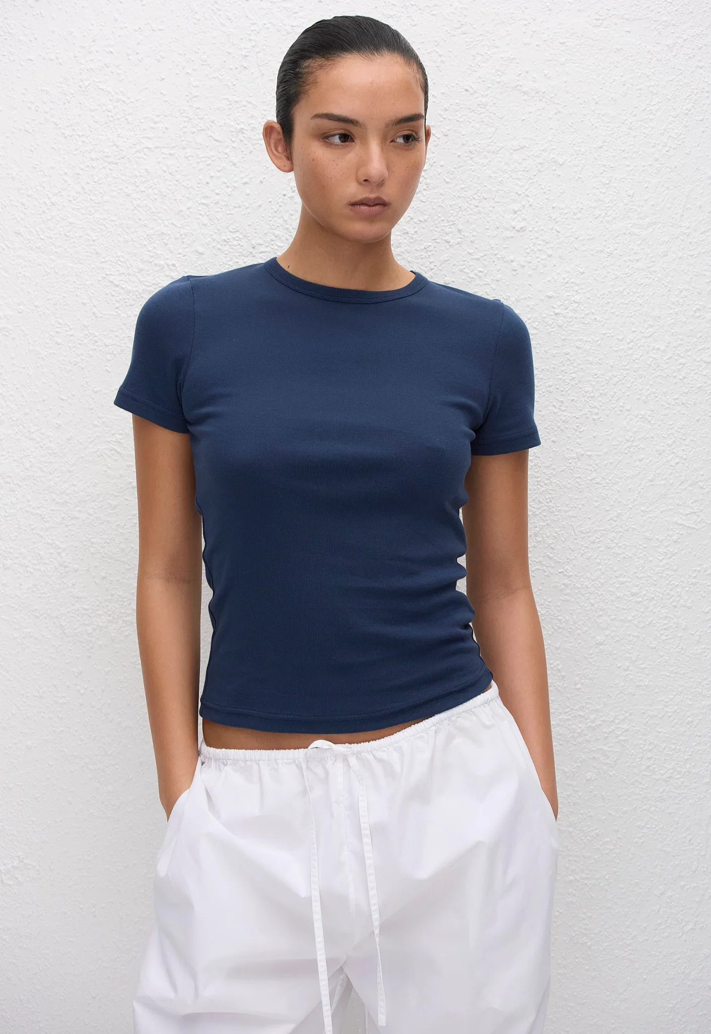 BABTP_VINTAGENAVY_BABYTEE_DCPTR-W_WHITE_DRAWCORDPANT_MODELDay02_Tari11485_1440x.webp