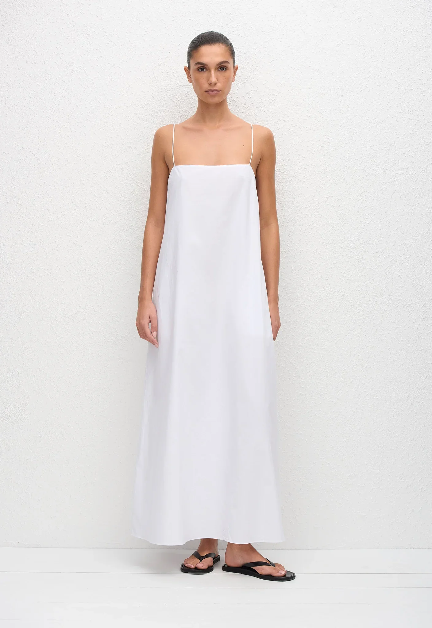 SCSDR_WHITE_SQUARECAMISUNDRESS_MODELDay04_Cristina16325_1440x.webp