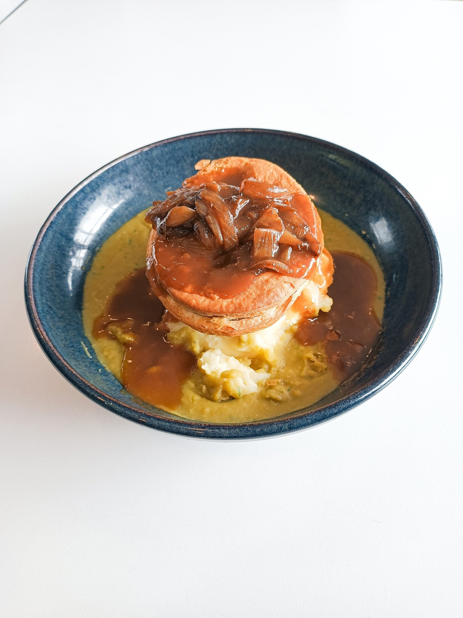 This week's comfort special, hot out of the kitchen. 🔥
 
Indulge in the savoury goodness of our Vili&rsquo;s Golden Beef Pie, served with classic sides of mushy peas, creamy mash potato, caramelised onion, and rich gravy&mdash;all for just $19.50! ?
