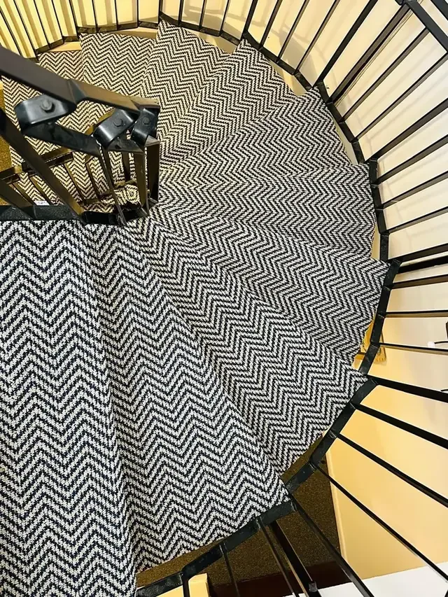 Staircase with stripey geometric pattern carpet runner in Bristol