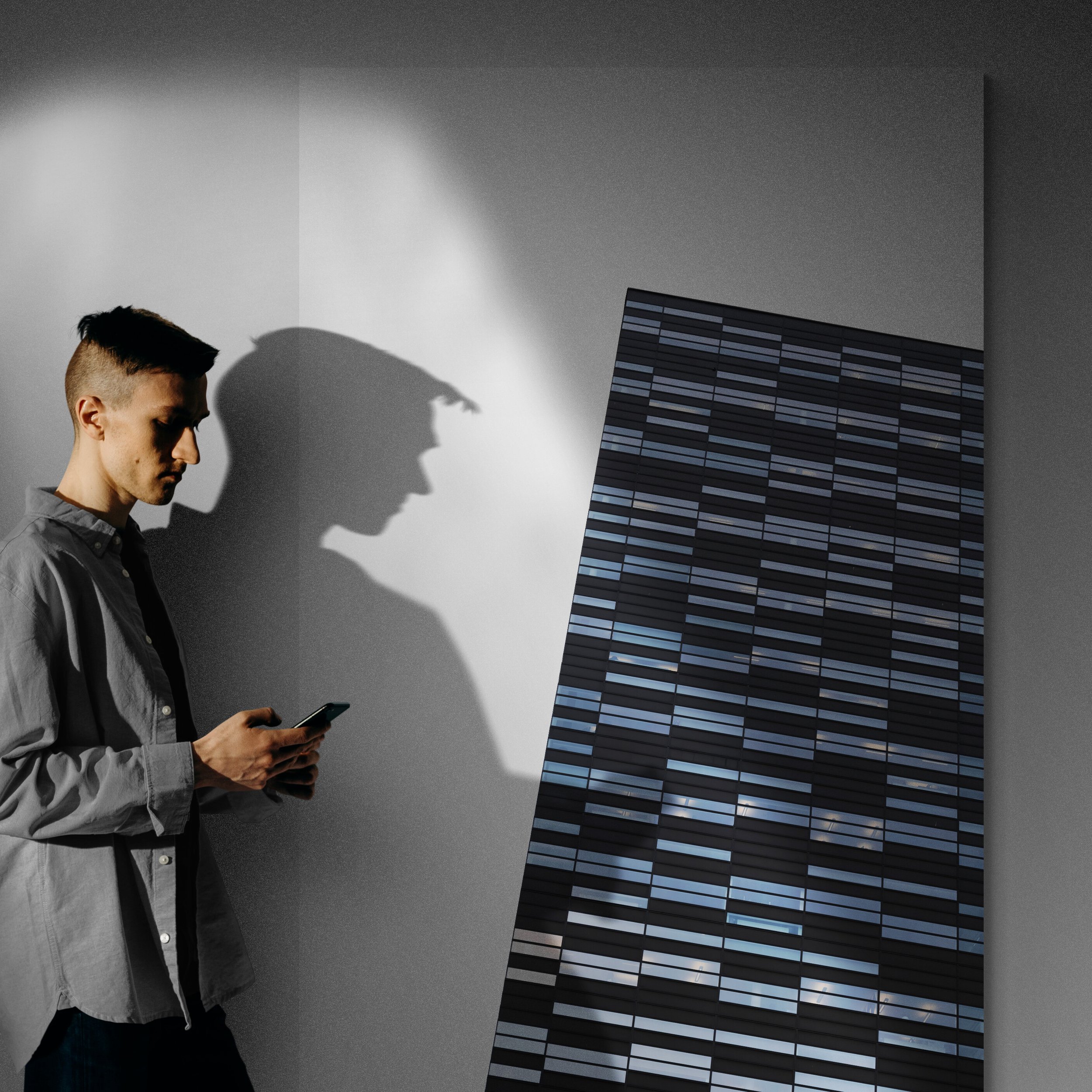 Young_man_on_mobile_phone.jpg
