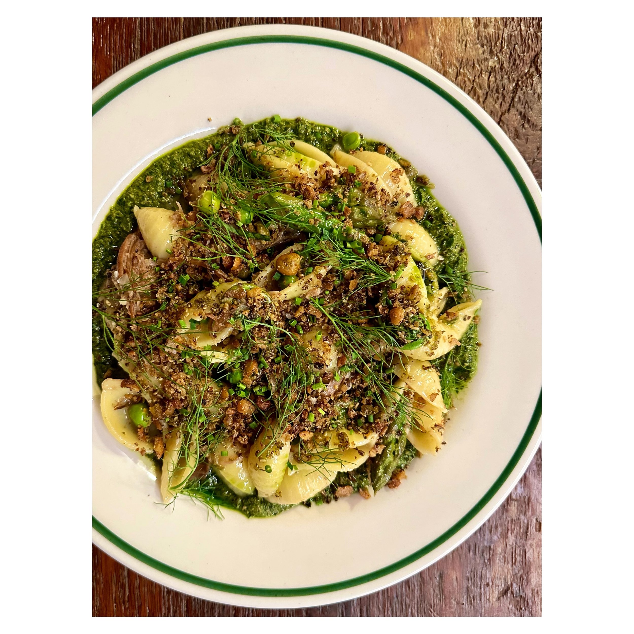 Tonight&rsquo;s Wednesday Wine + Pasta special: lamb and lemon pesto pasta with spring greens, peas, fresh herbs and crispy bits! Snag yourself a bowl with a glass of wine from a curated list for $30. Only tonight&mdash;the pasta changes weekly and m