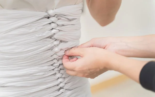 Geometric drawing of an outline square with sections divided by vertical, horizontal, and diagonal lines.