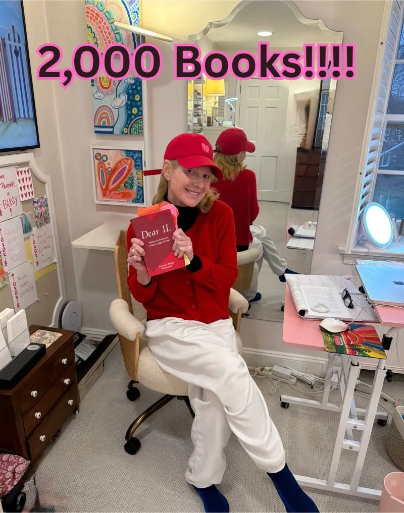 Amanda Haverstick holding her book Dear 1L