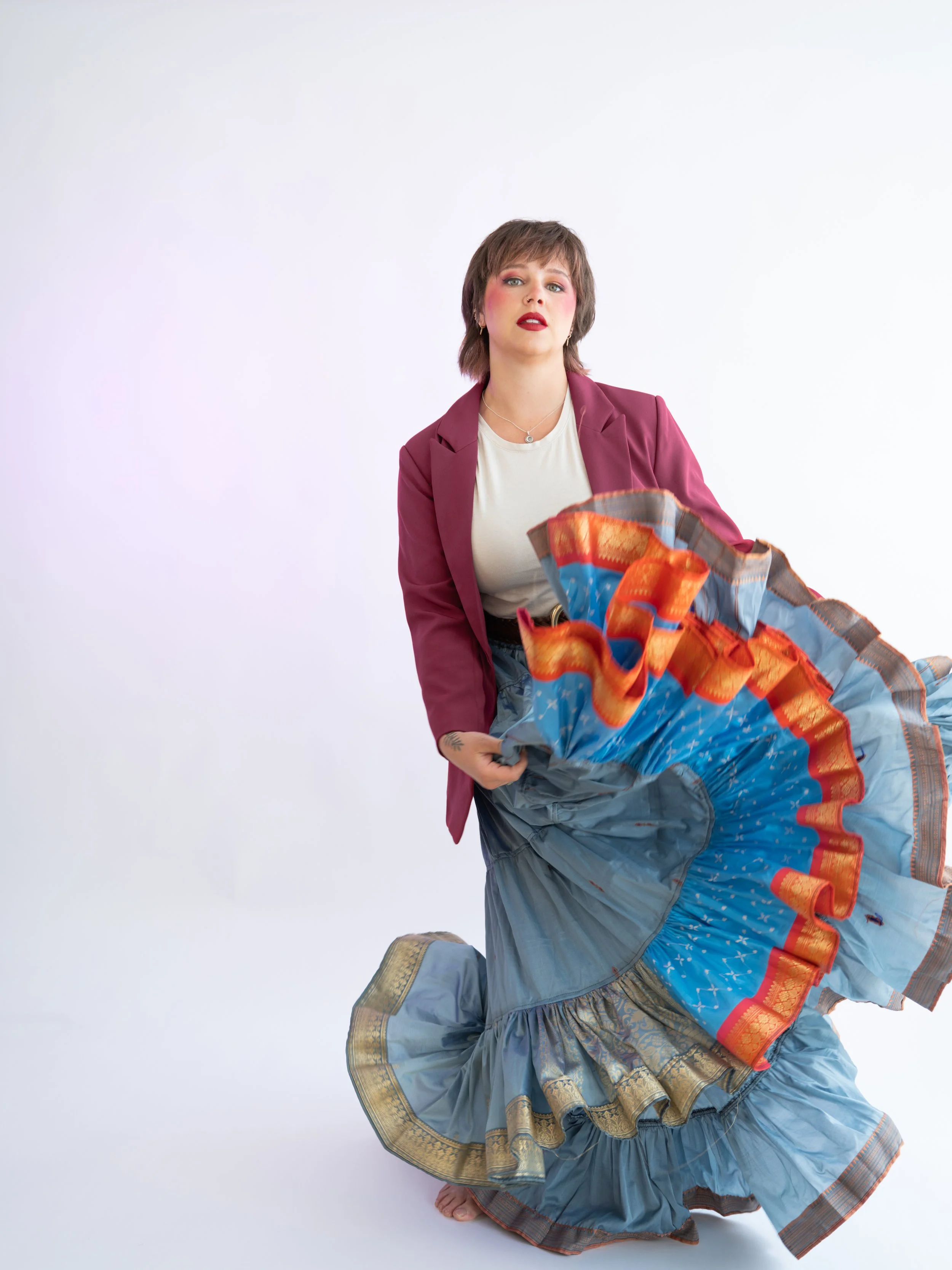Kristyna Zaharek Personal Brand Photoshoot white backdrop swirling skirt by Jama Finney Photography