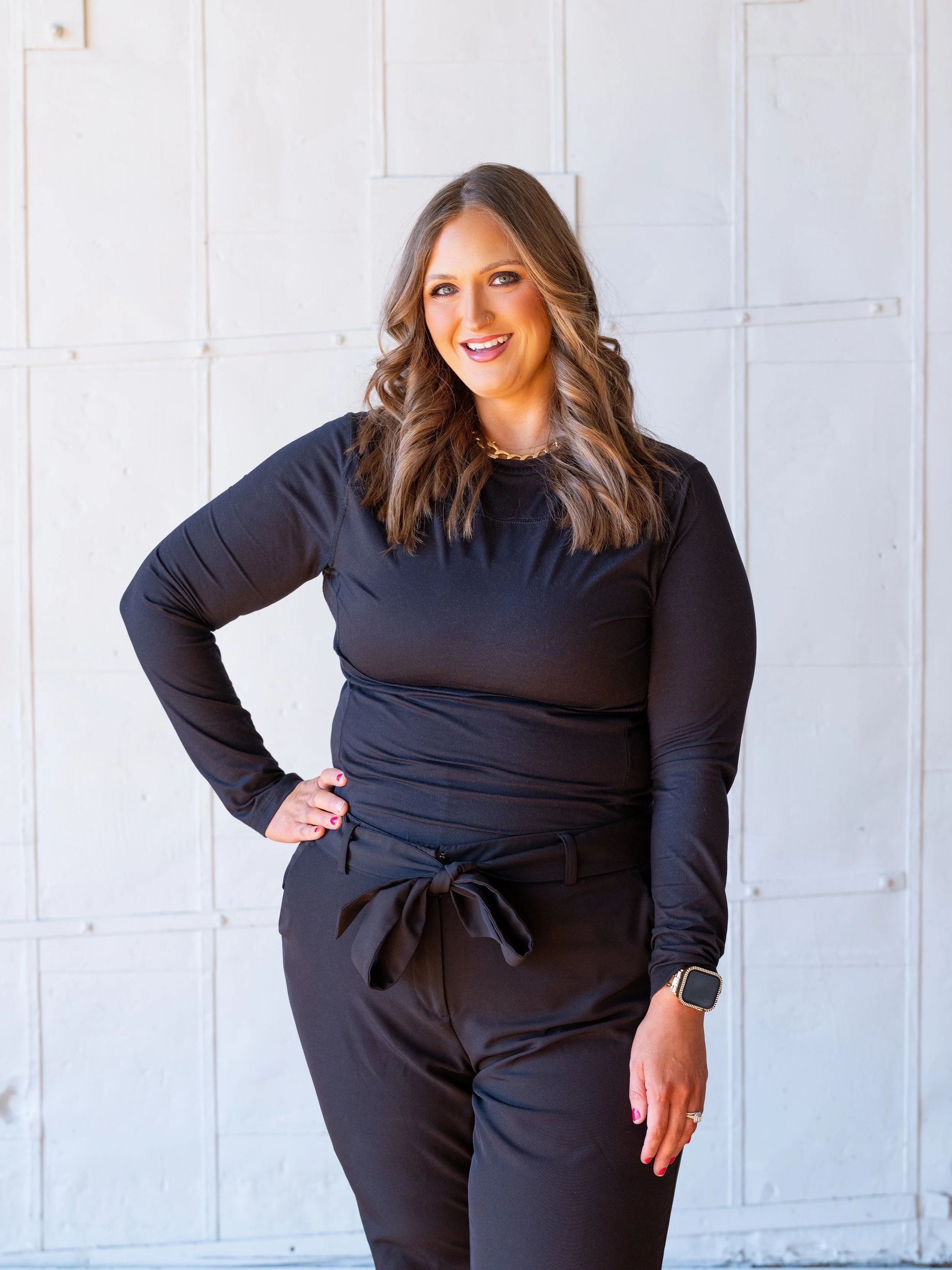 Confident editorial headshot of a professional stylist photographed by a Louisville branding photographer.