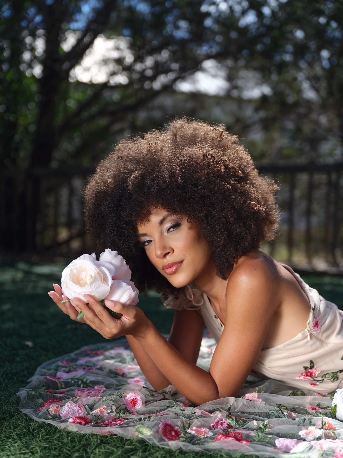 Midday sun. A gold reflector. One embroidered gown that looked like it was plucked straight from the garden.

@the_aniyalator_ had this quiet power about her, the kind that fills a frame without trying. The florals caught the light and shimmered like