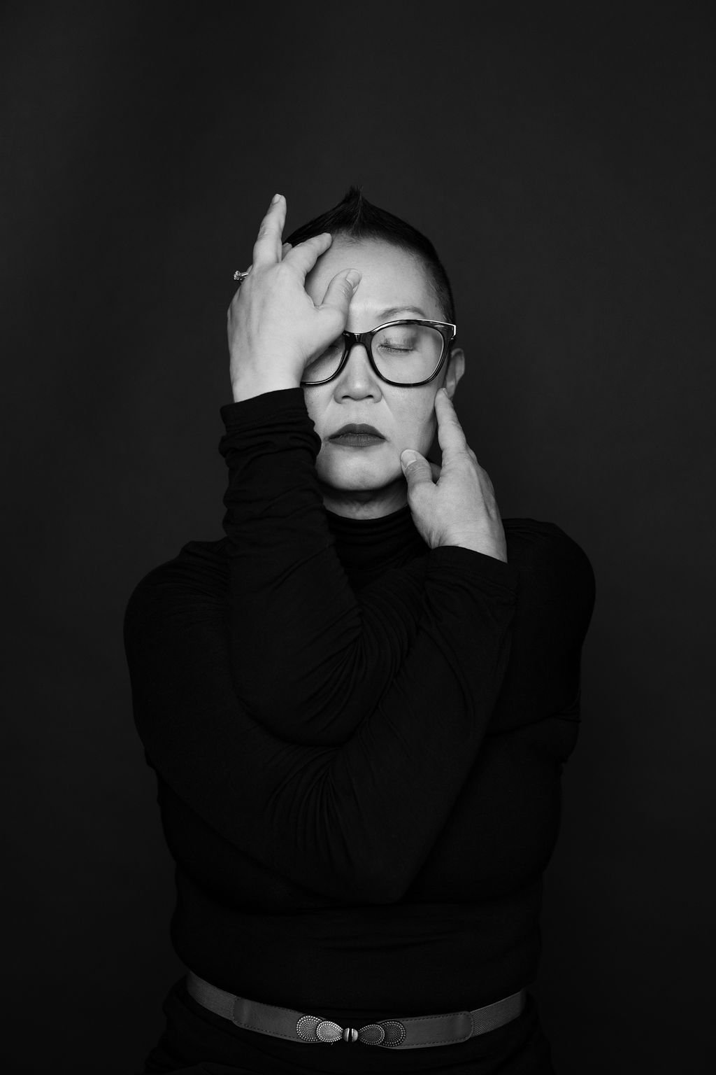 black on black fine art portrait of a woman