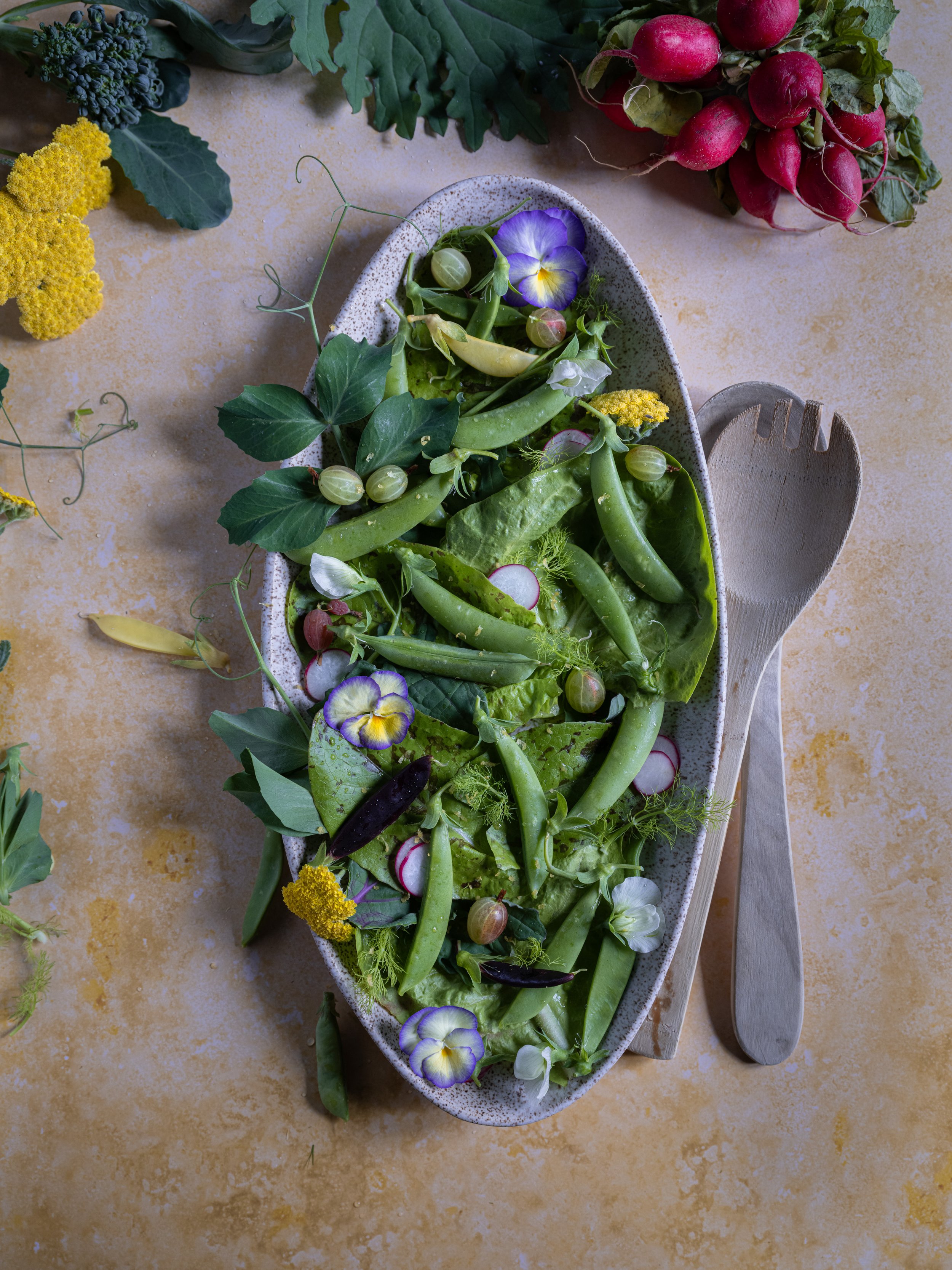 Pea, pansy and gooseberry salad Food Styling