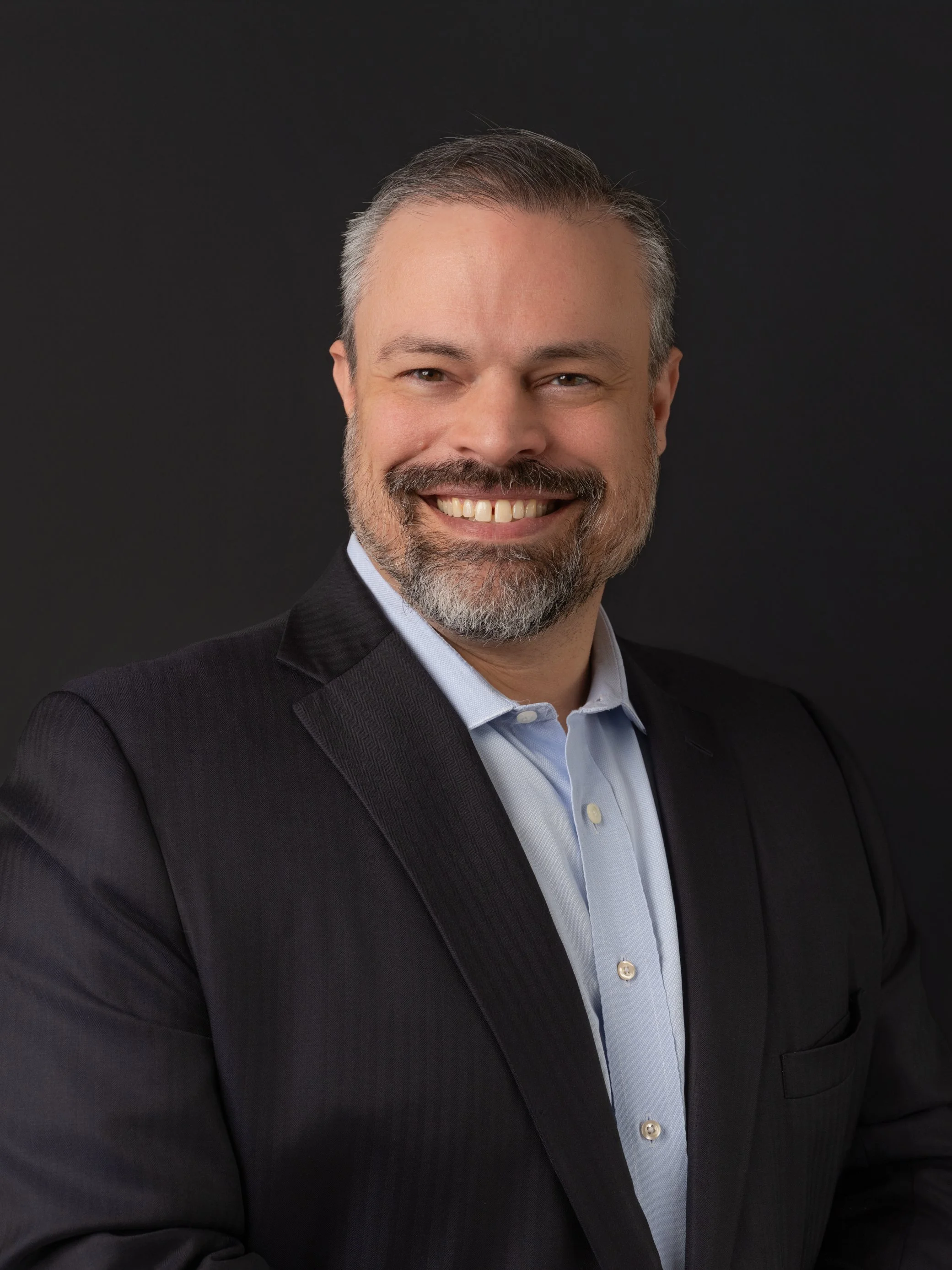 Executive headshot for business and LinkedIn profiles, photographed in Louisville with refined, modern lighting.