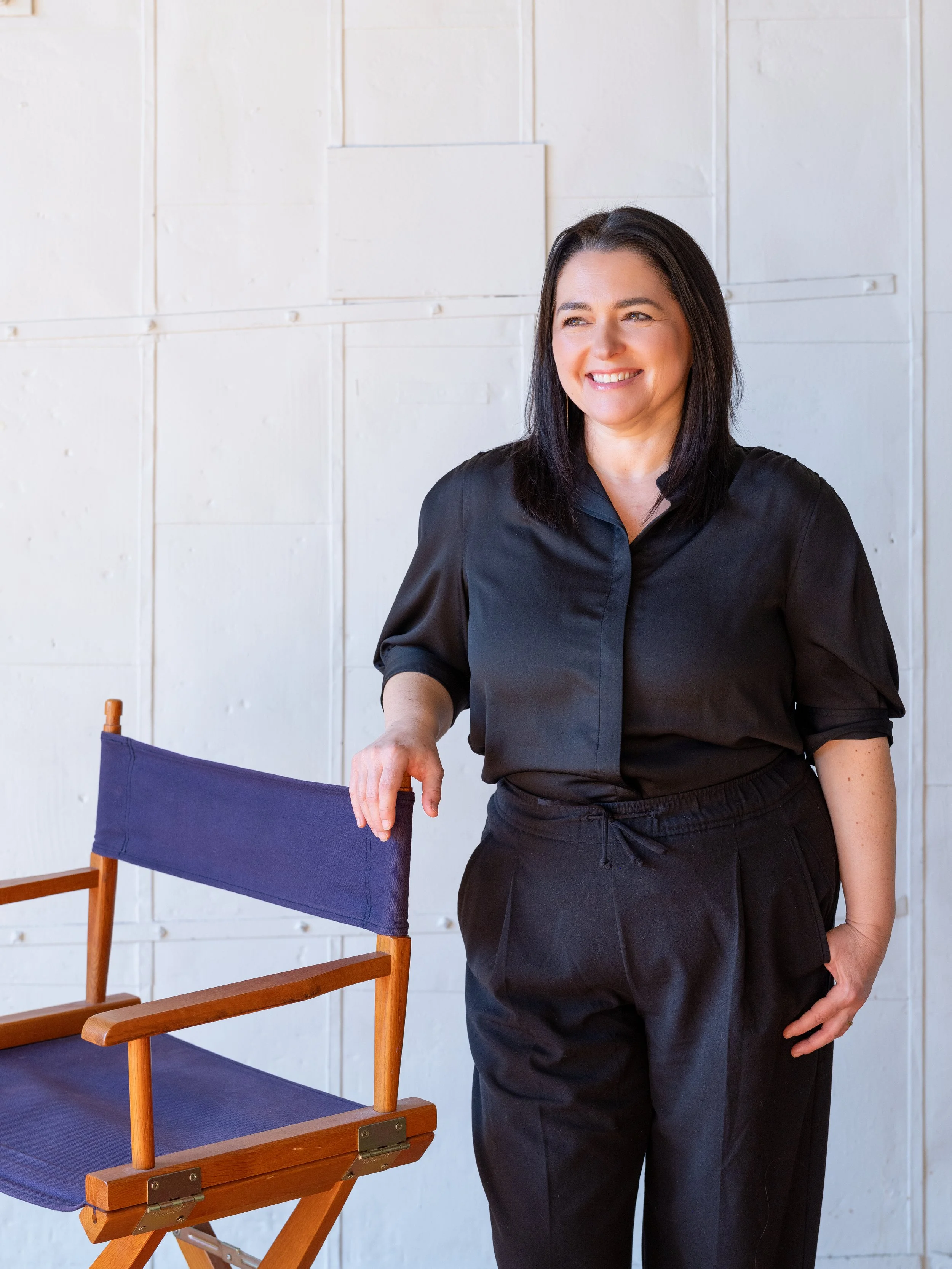 Confident editorial headshot of a professional stylist photographed by a Louisville branding photographer.