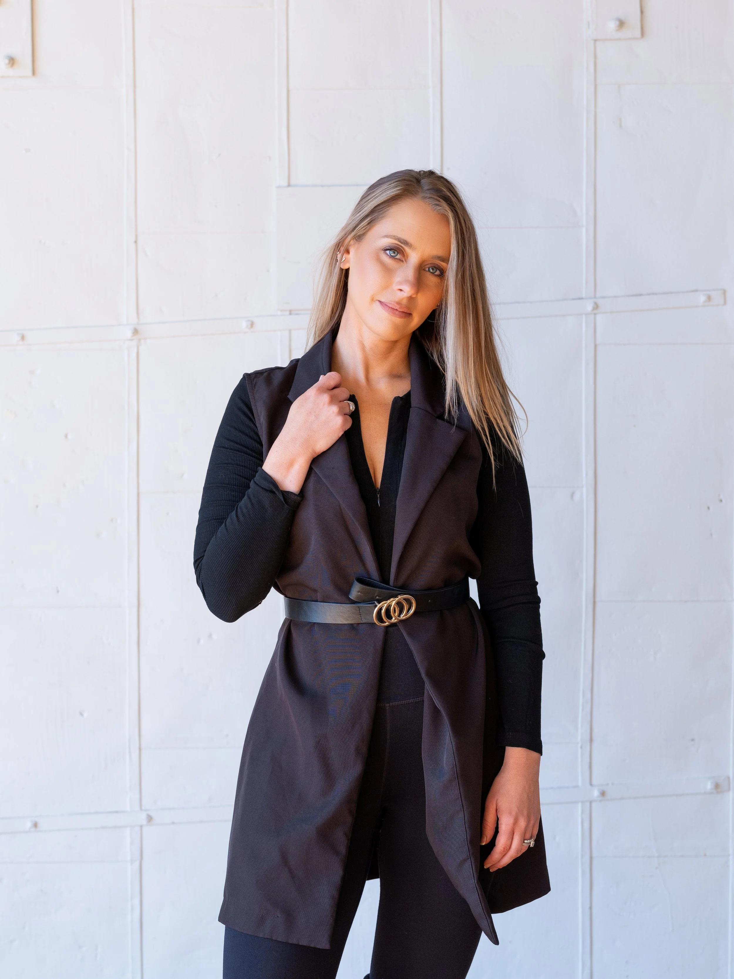 Confident editorial headshot of a professional stylist photographed by a Louisville branding photographer.