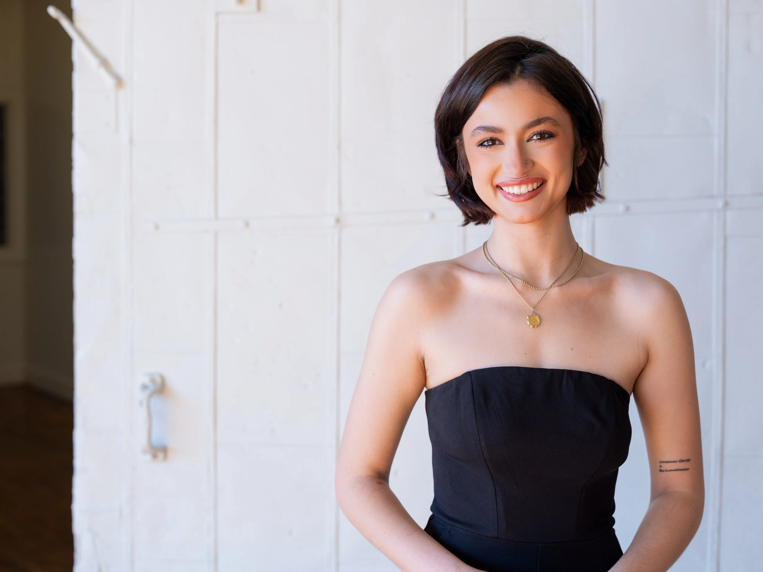 Confident editorial headshot of a professional stylist photographed by a Louisville branding photographer.
