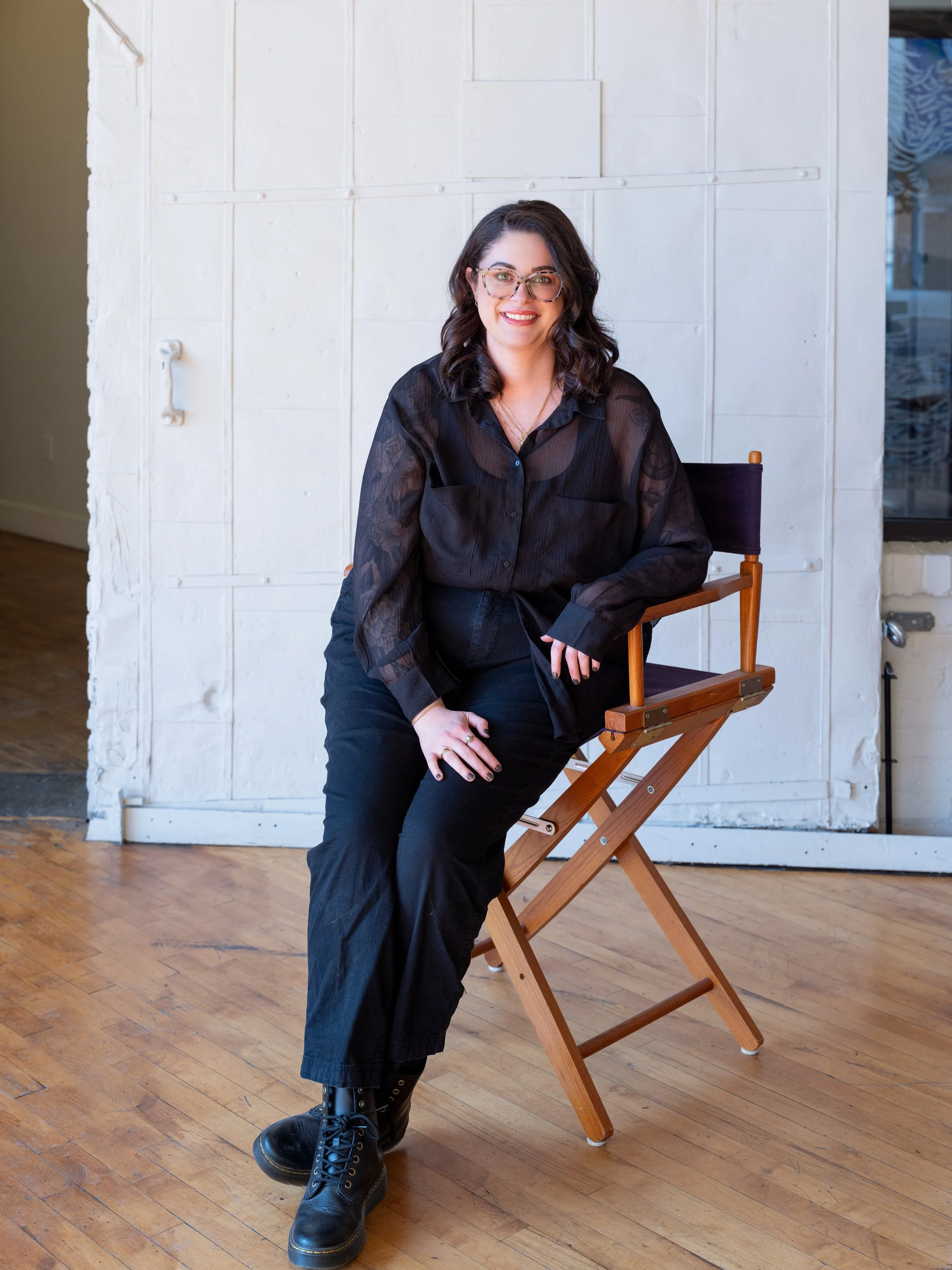 Natural light branding portrait of a professional makeup artist inside The Pointe in NULU, Louisville.