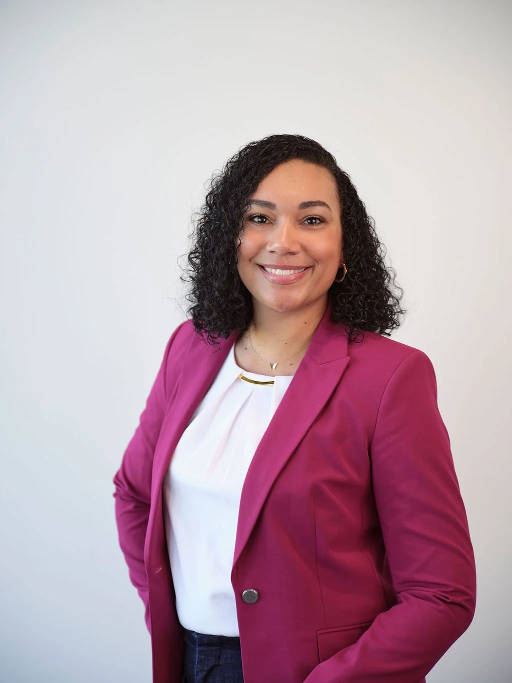 Professional headshot captured on location in a Louisville workplace environment with natural, clean tones.