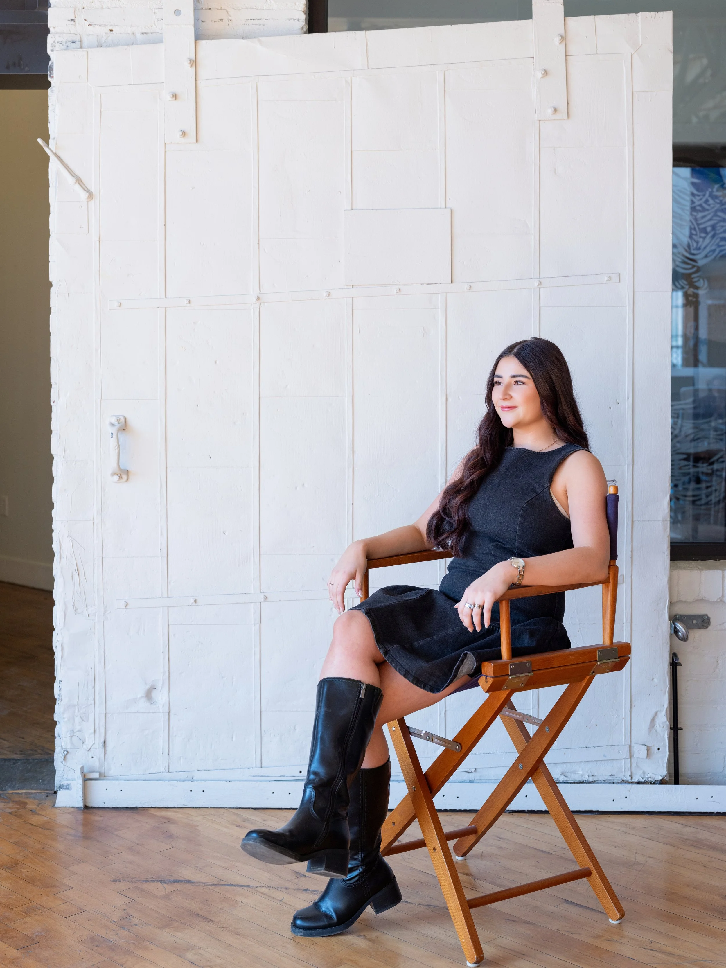 Natural light branding portrait of a professional makeup artist inside The Pointe in NULU, Louisville.