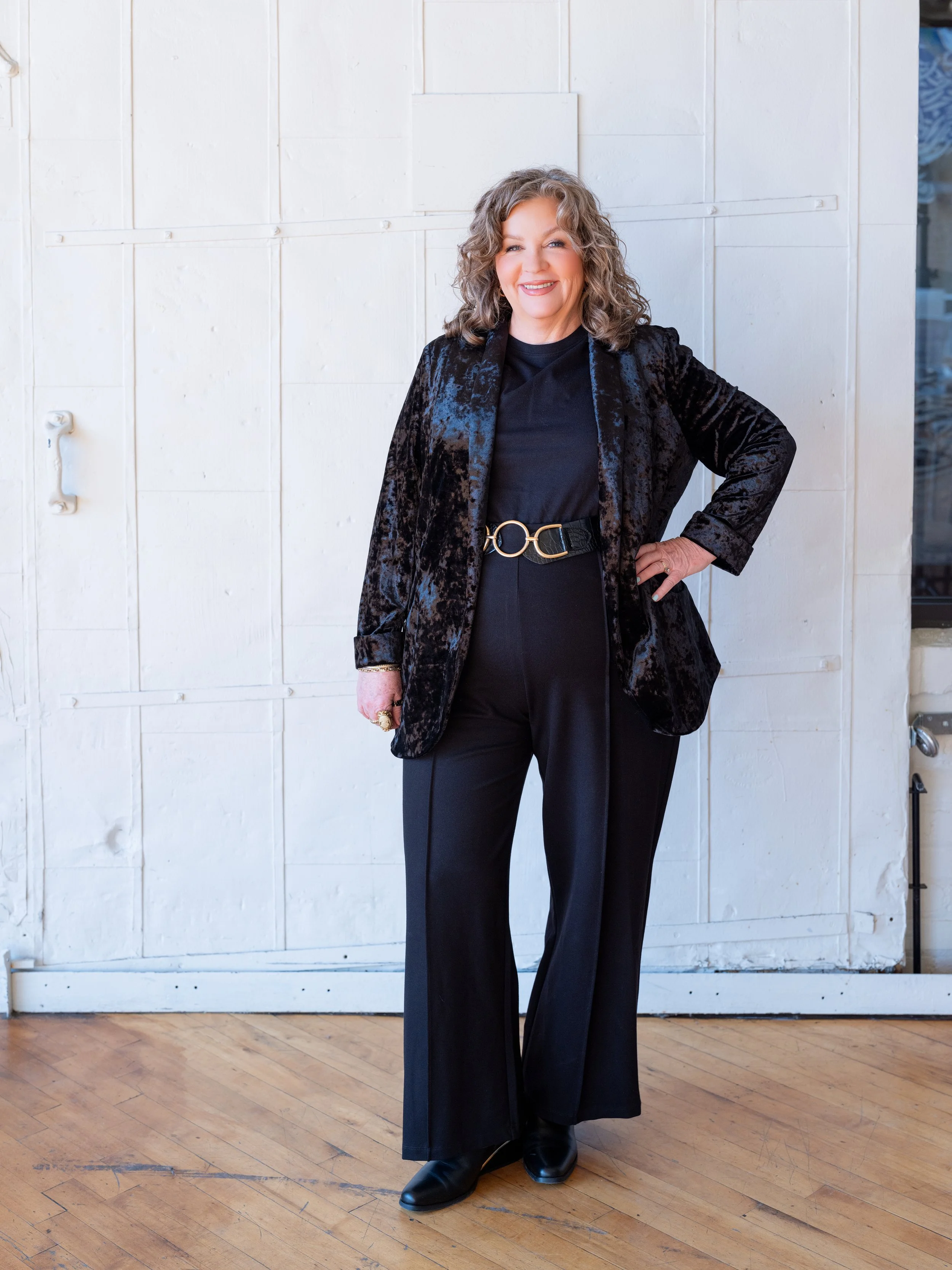 Confident editorial headshot of a professional stylist photographed by a Louisville branding photographer.