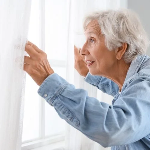 Person looking through the window.