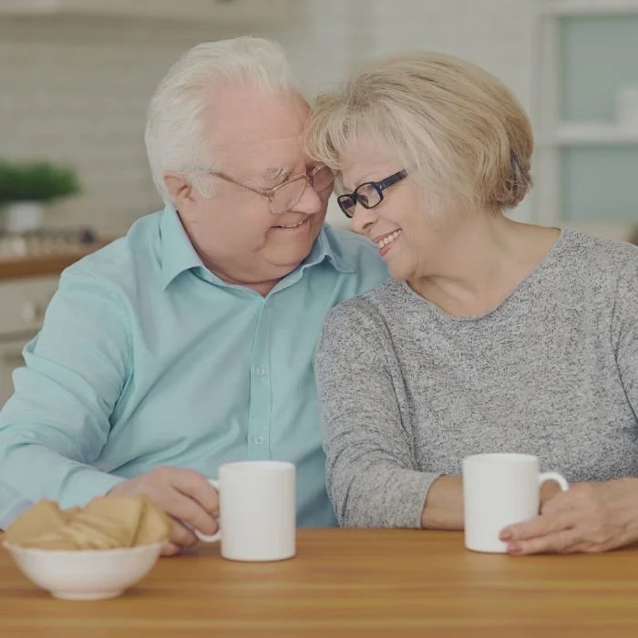 Couple drinking coffee in the kitchen