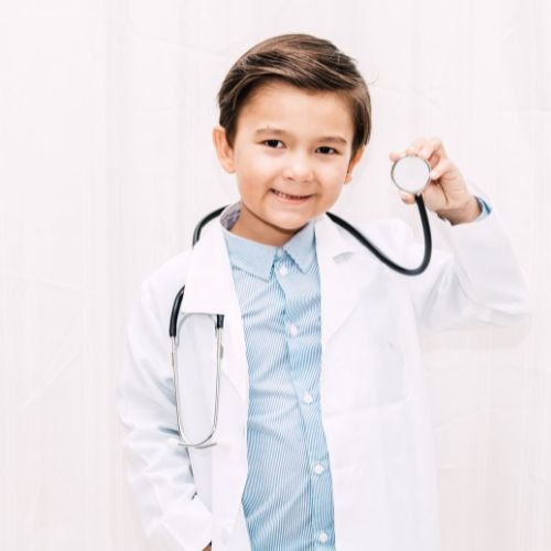 A child dressed as a doctor.