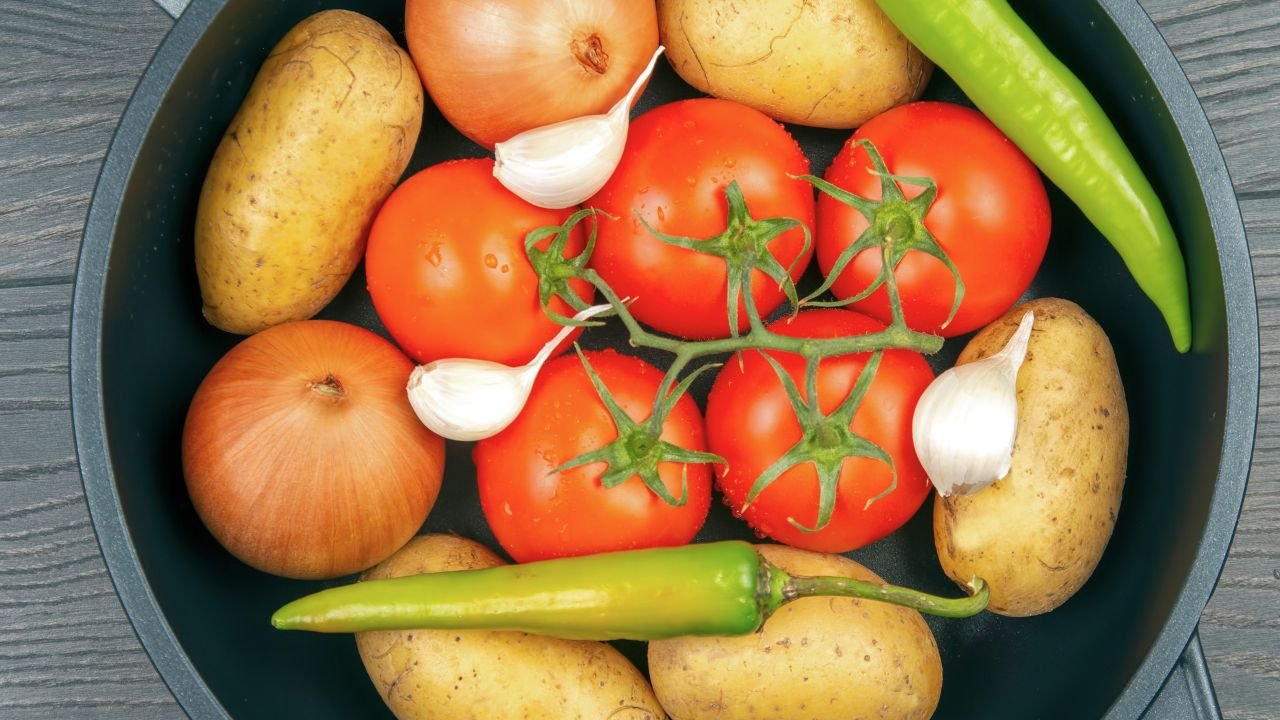 whole vegetables in a cast iron pan