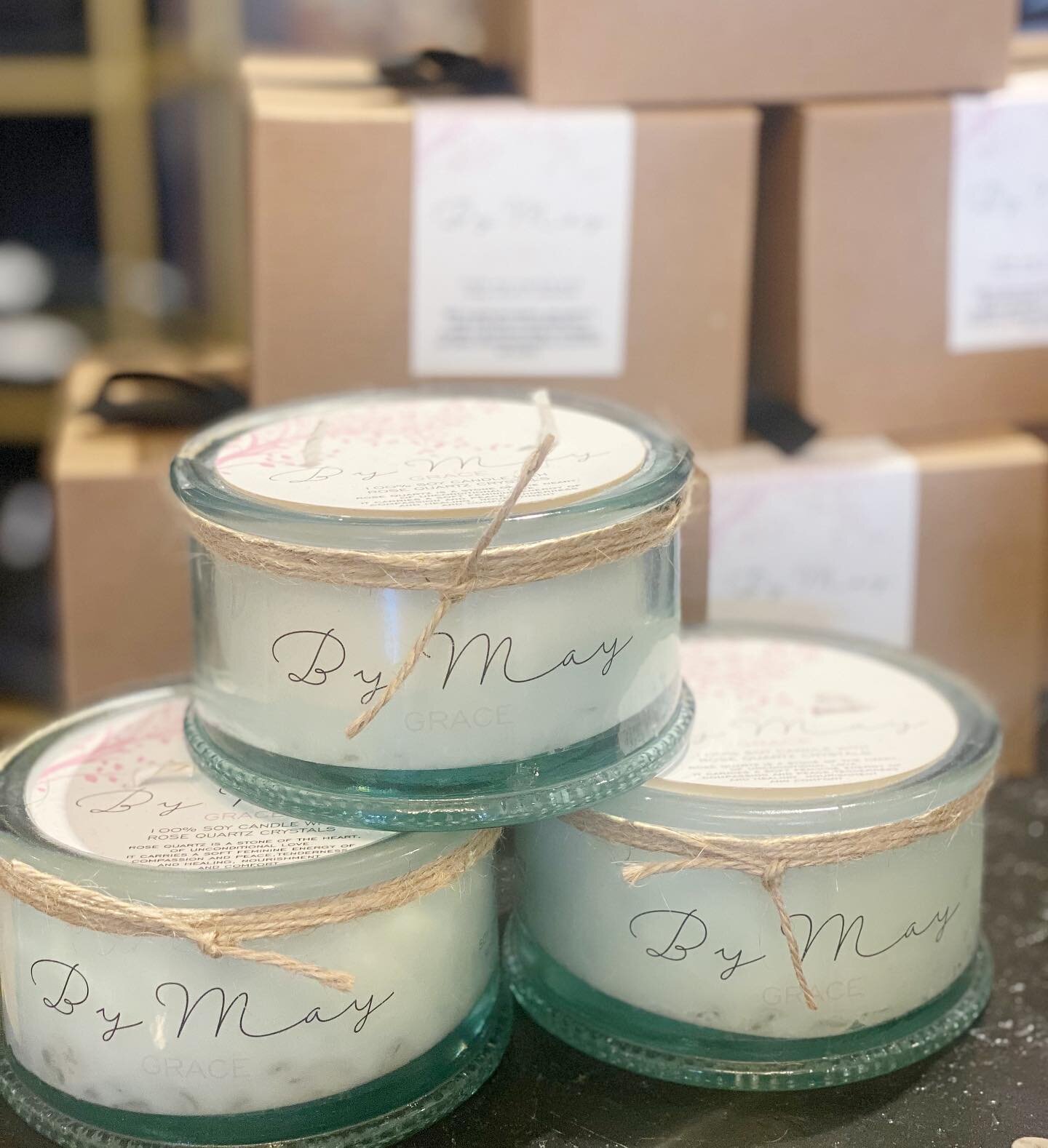 Our signature candles are back just in time for give giving season! We have added a new twist &mdash; each candle is made from soy wax with a 100% cotton wick. They contain a handful of #rosequartz chips to infuse the wax with a subtle vibration of #