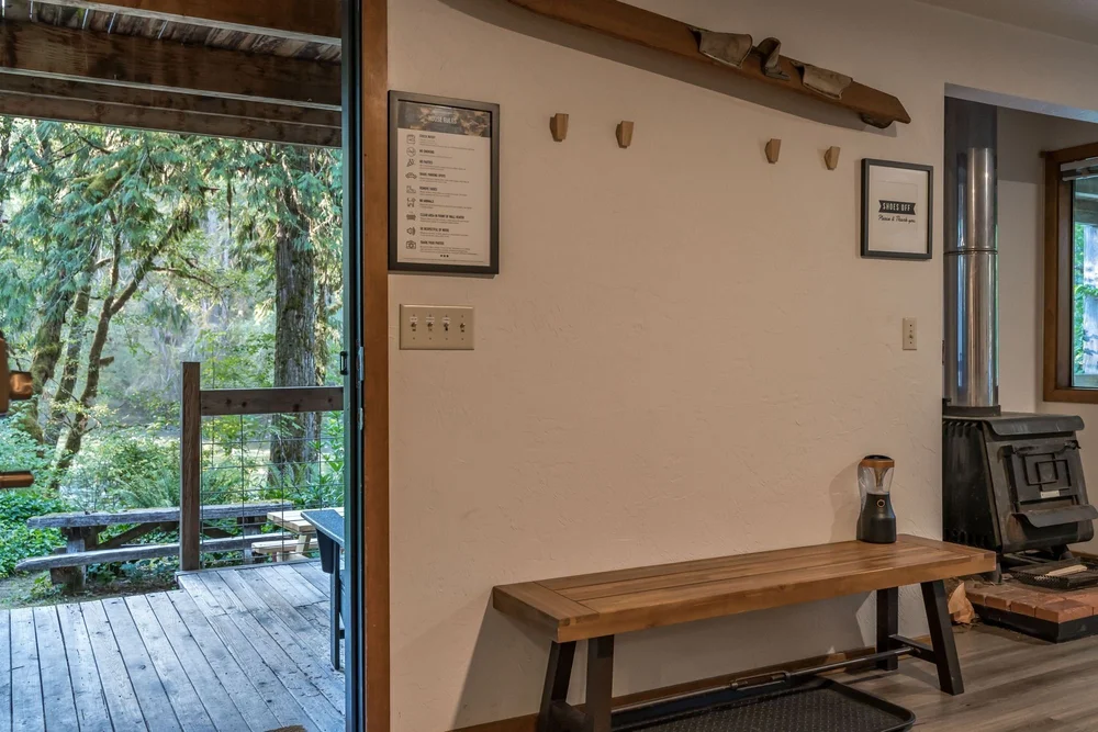 Open door to the deck and the forest