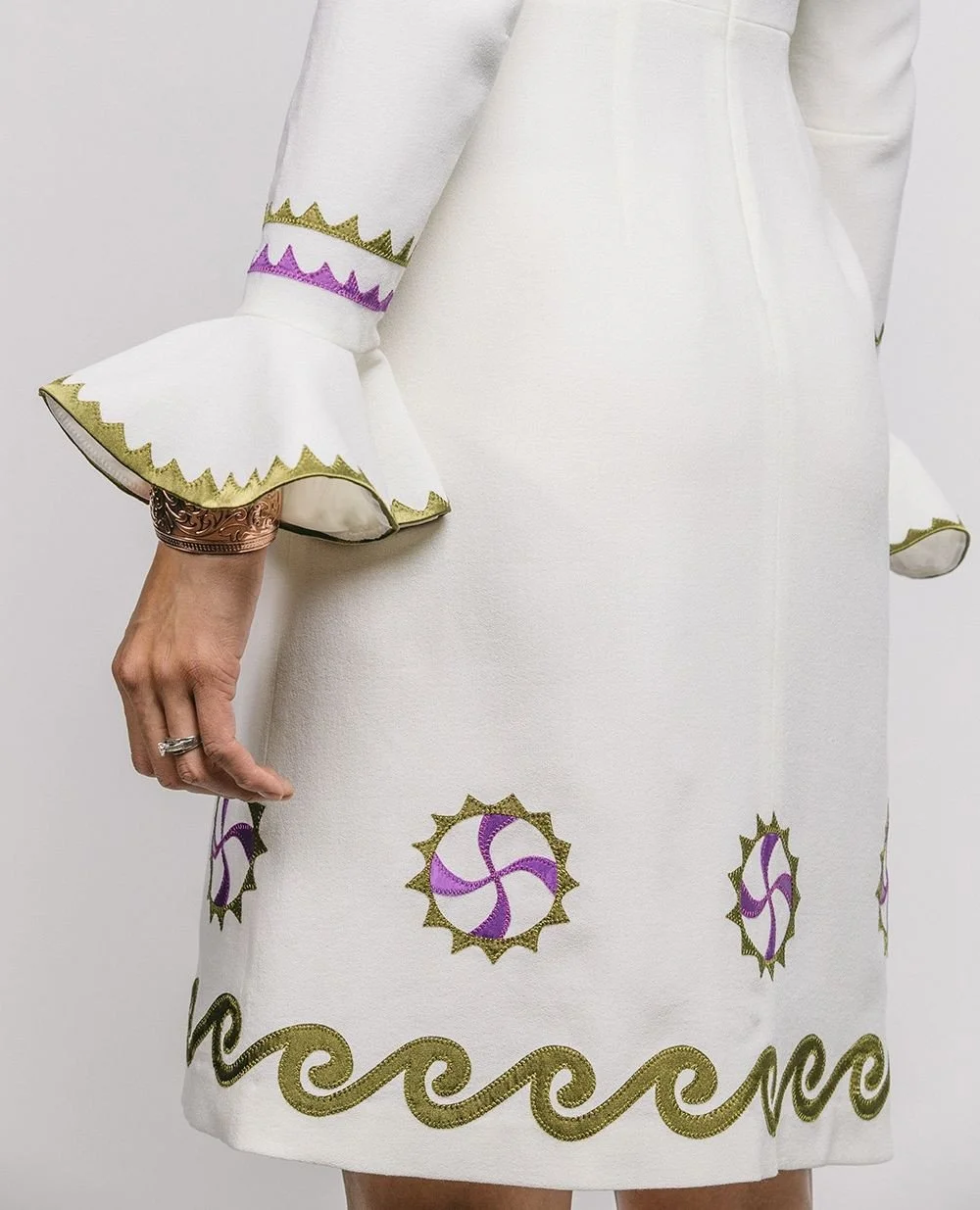 Are we feeling fall in the air? 🍂⁠
⁠
Winter whites with hand-cut and sewn appliqu&eacute; on a one-of-a-kind wool crepe dress ✨️⁠
.⁠
.⁠
.⁠
#nativeart #mvskoke #buynative #muscogee #indigenous #shopsmall #indigenousart #indigenouswomen #wip⁠
#textile
