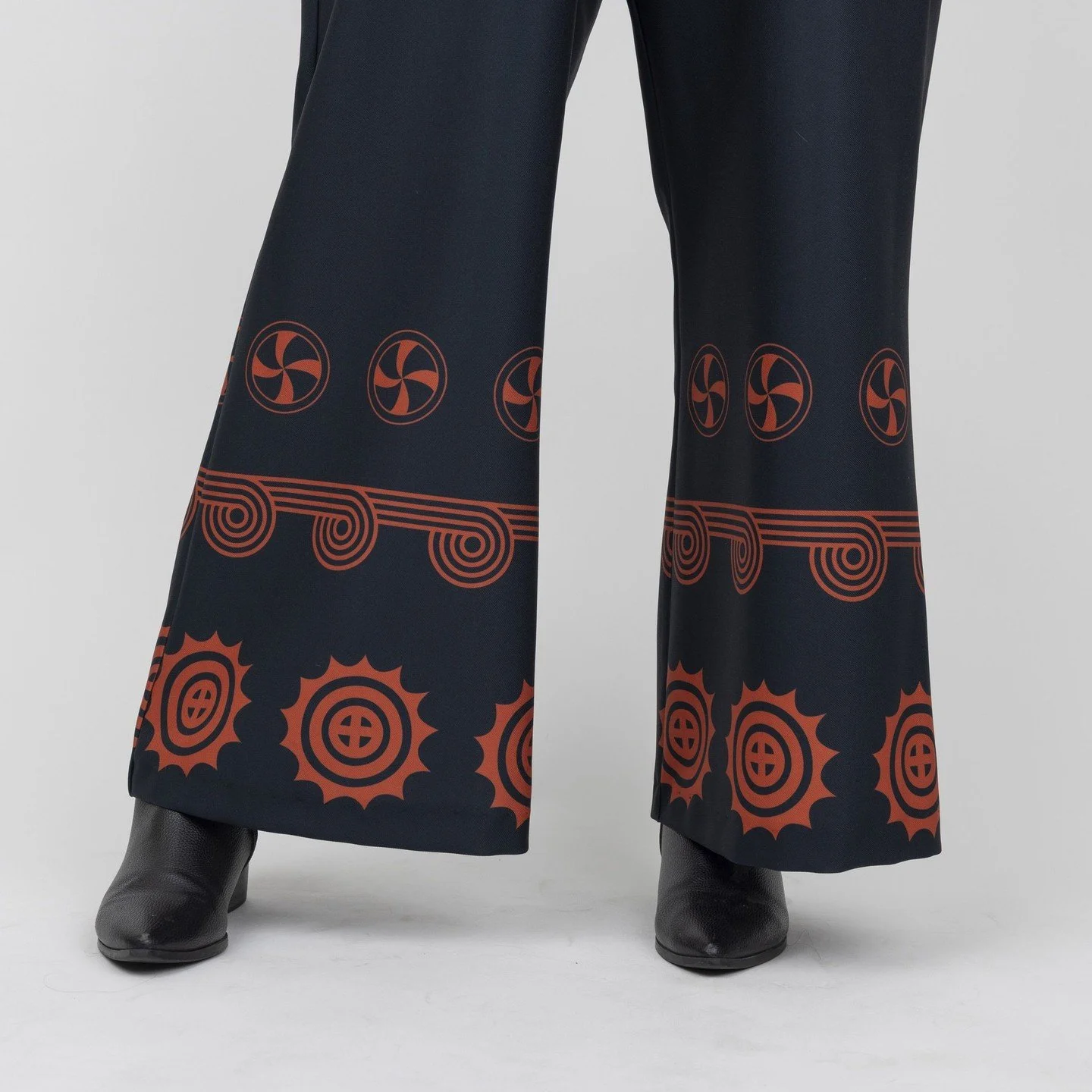 Meet the Winter Copper Pant ❄️☀️⁠
⁠
This pant is printed with copper motifs at the hem and made from heavy weight Poly Gabardine. It features a flat front waistband, elastic back waistband, and front decorative pockets.⁠
⁠
The entire Winter Copper co